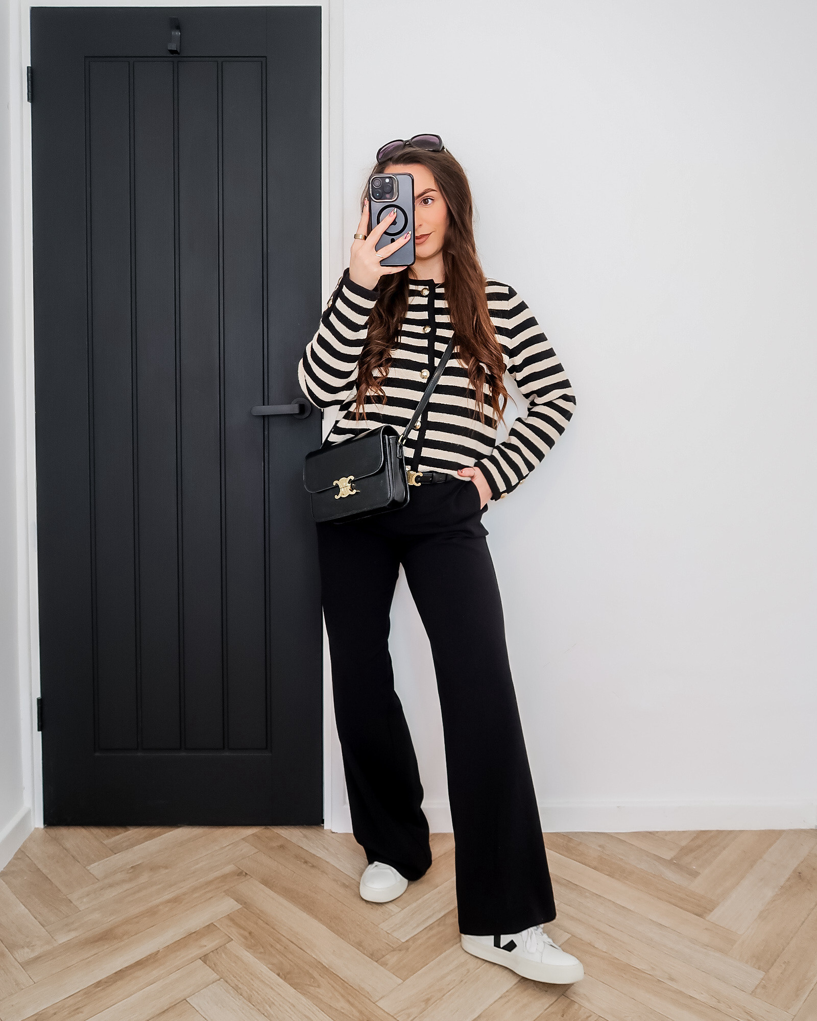 striped cardigan, spring cardigan outfit, black tailored trousers, veja trainers outfit, celine belt outfit, celine bag outfit, chic everyday outfit, capsule wardrobe style, classic spring outfit, minimal chic outfit, effortless style outfit, parisian inspired outfit 

#LTKeurope #LTKspring #LTKuk