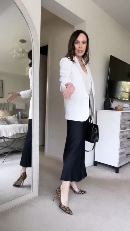 Styling a black slip skirt with a white blazer and white camisole. Perfect for the workplace! 

#LTKover40 #LTKSeasonal #LTKworkwear