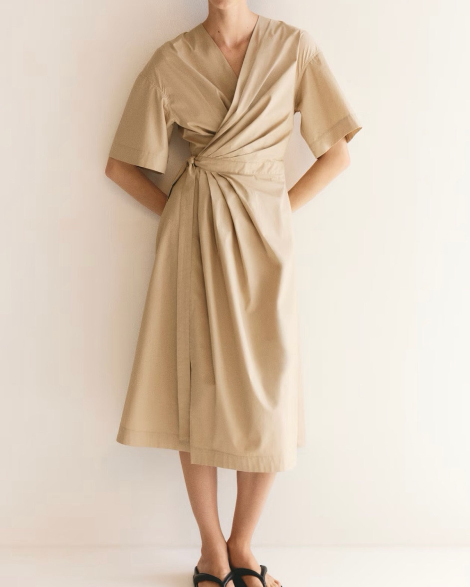 Tan wrap midi dress

#LTKSeasonal