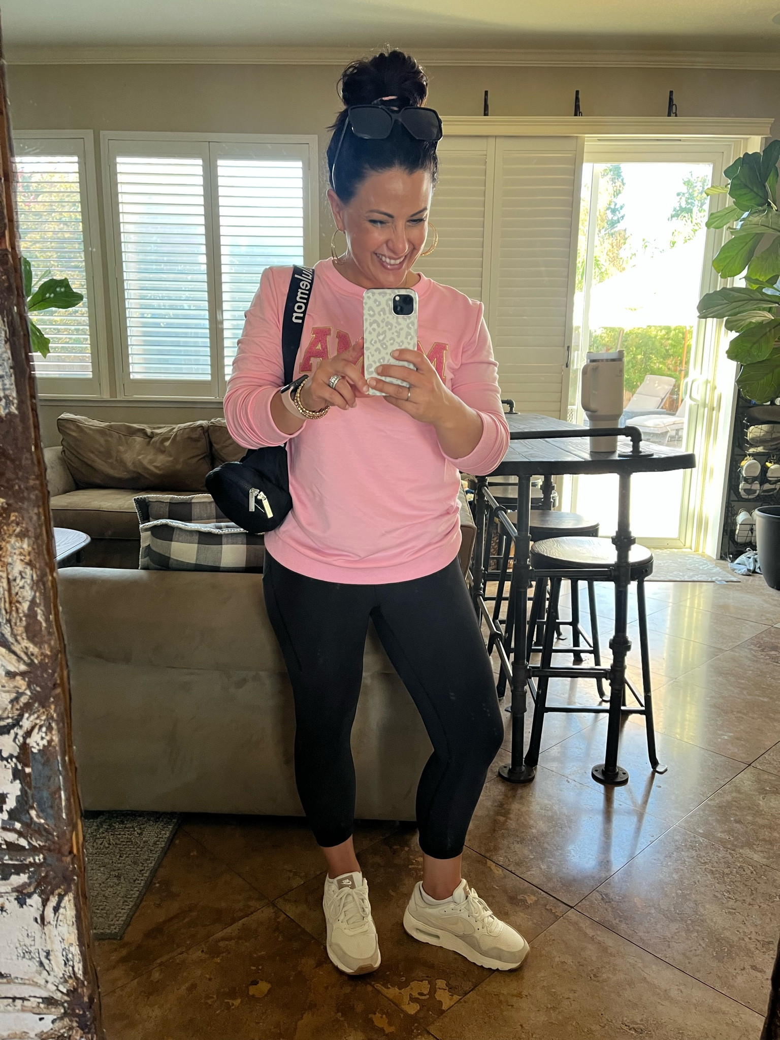 Spirit day at school day was soccer moms vs bbq dads. I wore my favorite leggings, mama sweatshirt, and sneakers. Of course I had all my soccer mom accessories, Lululemon belt bag, Stanley cup, sunglasses, and a messy bun! I would size up in this sweatshirt, I’m wearing a medium.

#LTKfindsunder50 #LTKfitness #LTKover40