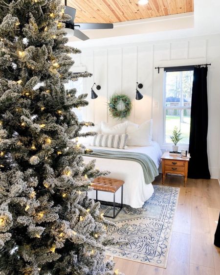 Christmas master bedroom

White bedroom
Master bedroom at Christmas time 
Holiday bedroom
Christmas bedroom
Flocked Christmas tree
9’ Christmas tree
Bedroom rug
Black curtains
Velvet curtains
Wall sconces
Swing arm wall sconces
Bed bench
White beddingg

#LTKhome #LTKHoliday #LTKSeasonal