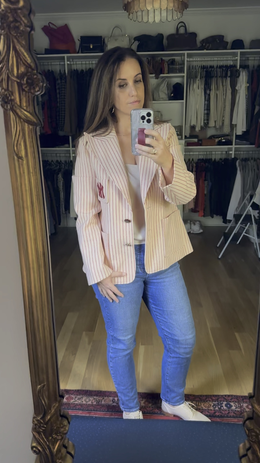 So excited to wear this pinstripe #Gucci blazer. This is from the collab with the New York Yankees and I love the coloring on it, especially the buttons. It’s wool so it’s heavyweight but the colors work all year round. Love pairing these with a simple silk tank, straight leg jeans and oxford flats. 

#LTKWorkwear #LTKVideo #LTKStyleTip