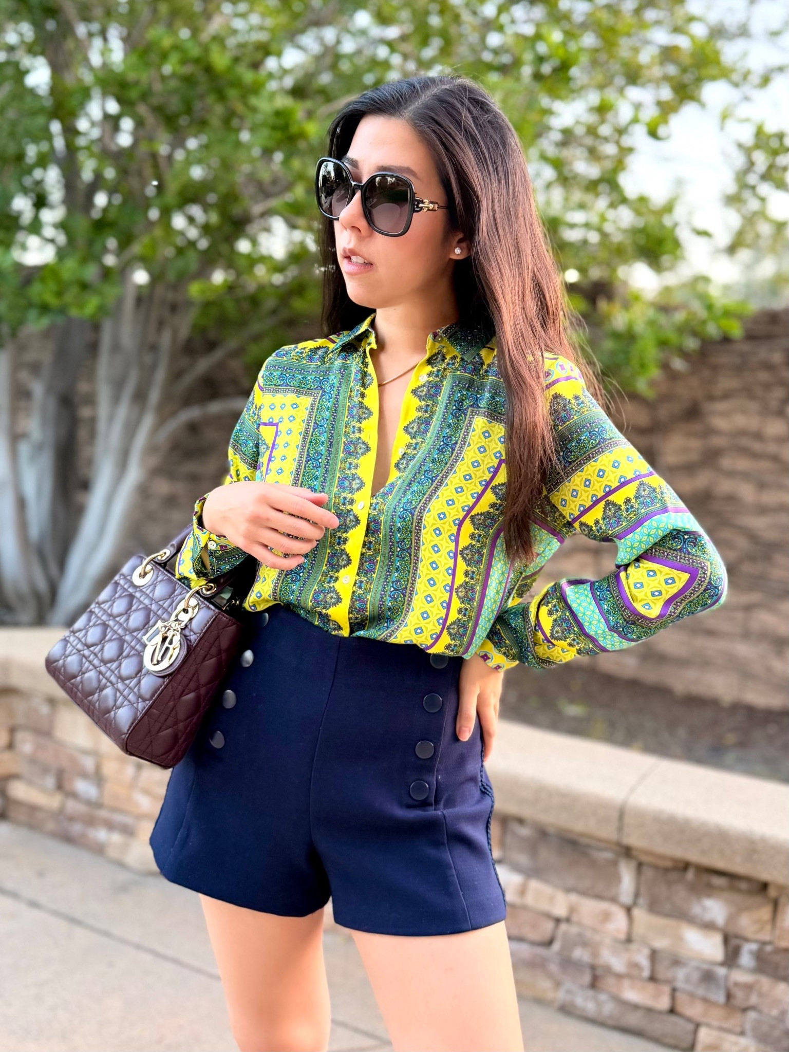 It was 80 this past weekend and I enjoyed the warm sunny weather. I have so many collar button down shirts and my goal is to wear all of them at least once this year. If I find any of them hard to style, I’ll be listing it on my Poshmark. This year is all about decluttering and shopping my own closet! For this look, I paired a chartreuse printed top with high waisted blue sailor shorts and my amaranth Lady Dior.

#highwaistedshorts #sailorshorts #ladydior #versace #silktop

#LTKPetite #LTKSeasonal #LTKgrwm