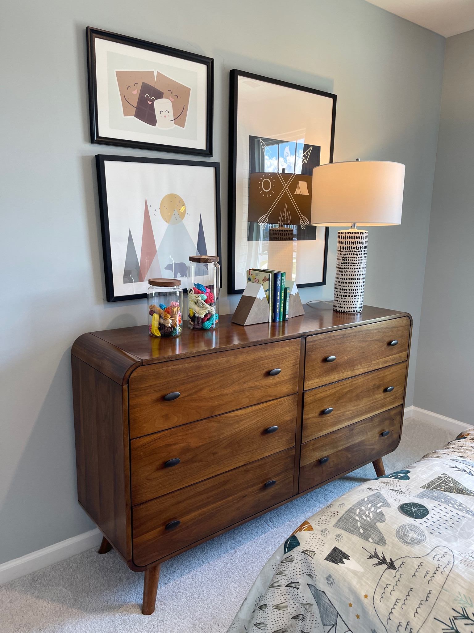 This 6-drawer dresser offers ample storage and a modern look with its curved, rounded edges. Made from solid walnut and engineered wood with a rich brown finish, it features six dovetailed, felt-lined drawers and gunmetal pulls.

#LTKHome #LTKSaleAlert