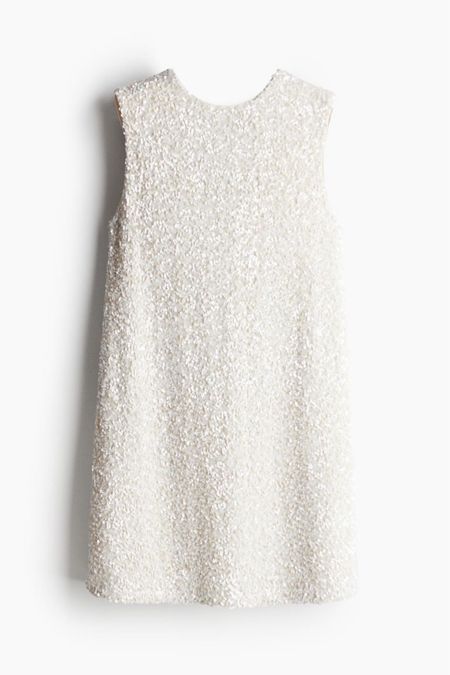 White sequined mini dress with bow back 

#LTKSeasonal #LTKfindsunder100 #LTKstyletip