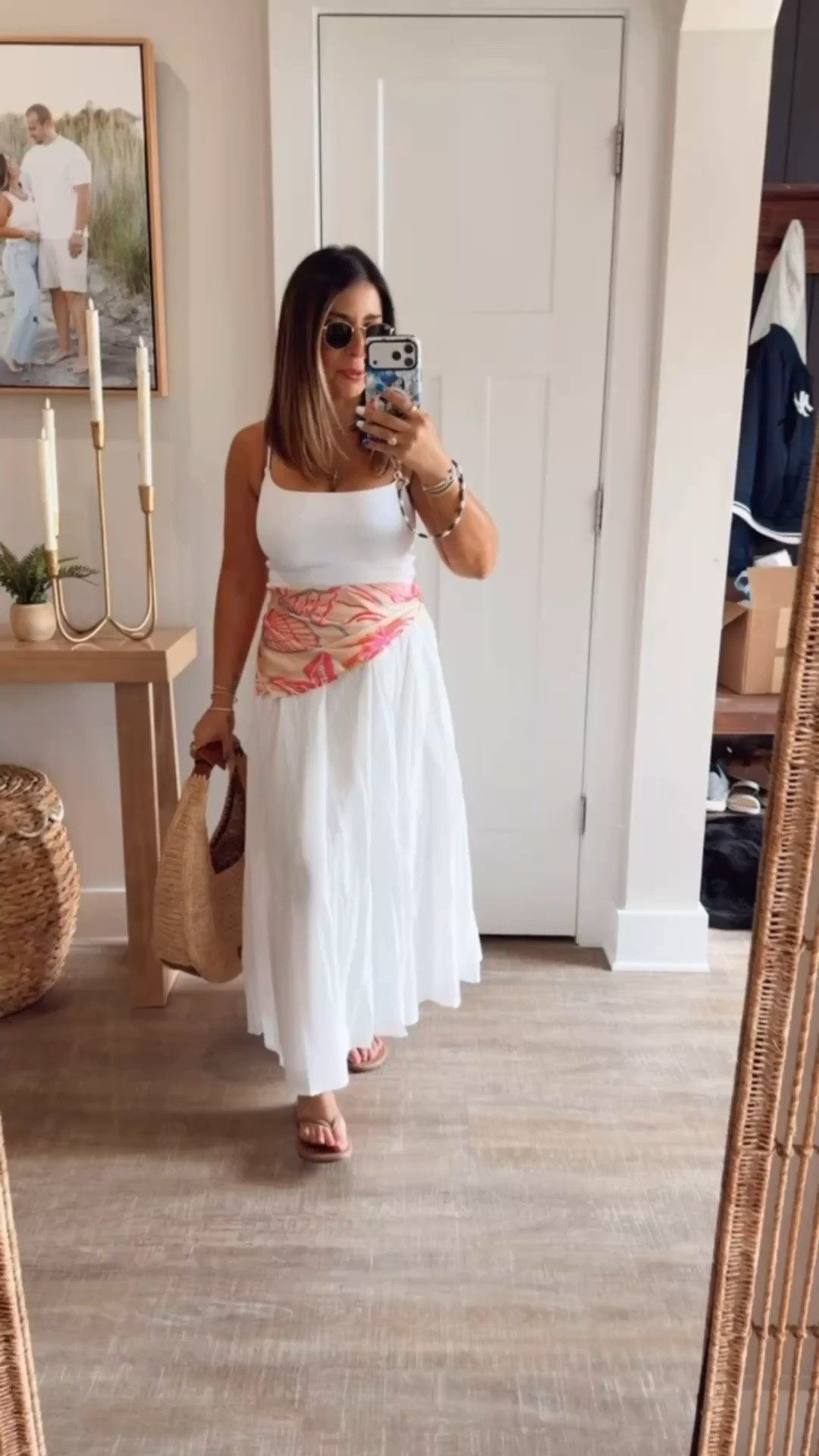 This monochromatic skirt and tank top is already stunning, but when I added this colorful scarf, I became officially obsessed. This look gives major European vaca vibes and I’m here for it. This raffia handbag, neutral flip flop sandals and chic circle sunglasses complete the outfit. 
Summer outfit inspo

#LTKPetite #LTKMidsize #LTKSeasonal