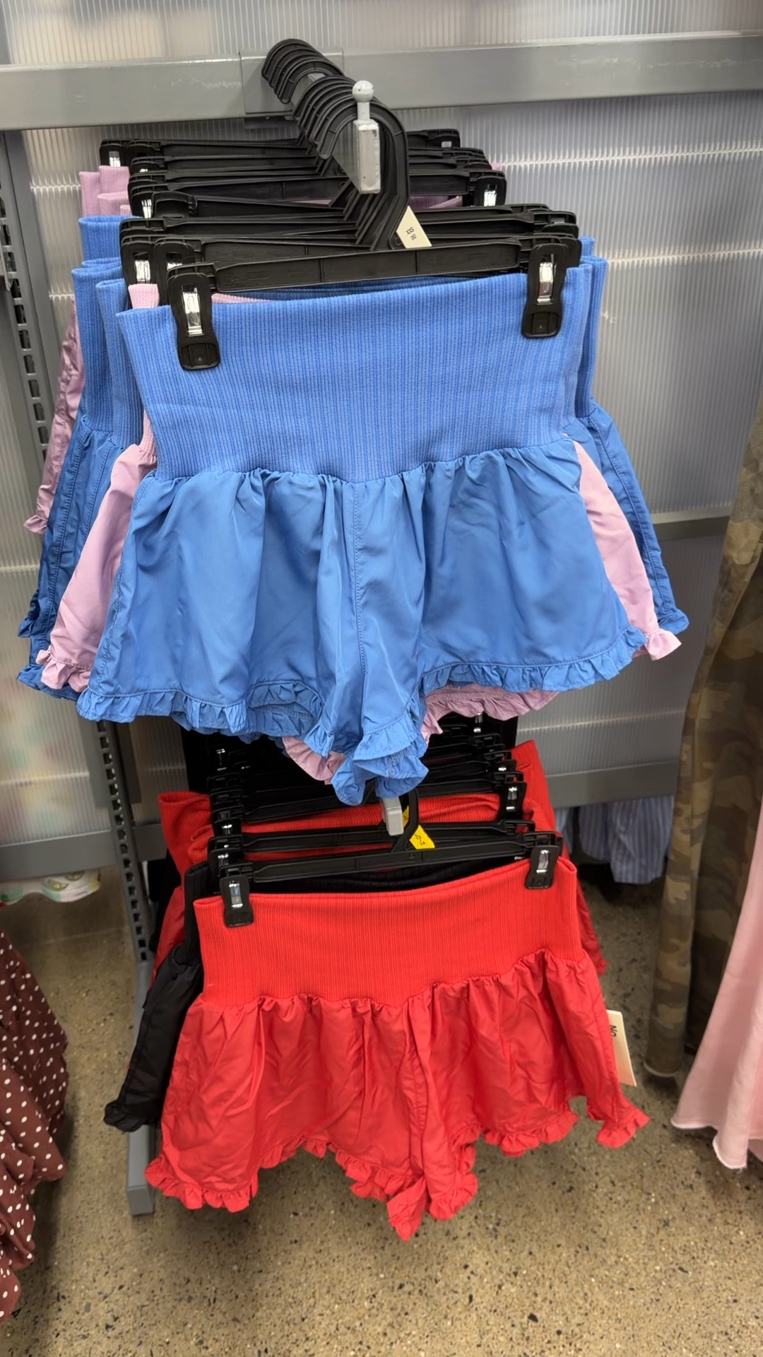 These wide waistband ruffle shorts are flying off the shelves! I actually saw someone wearing these at the mini golf place in Michigan! She looked so cute! Four colors, matching tanks. #walmartfashion
