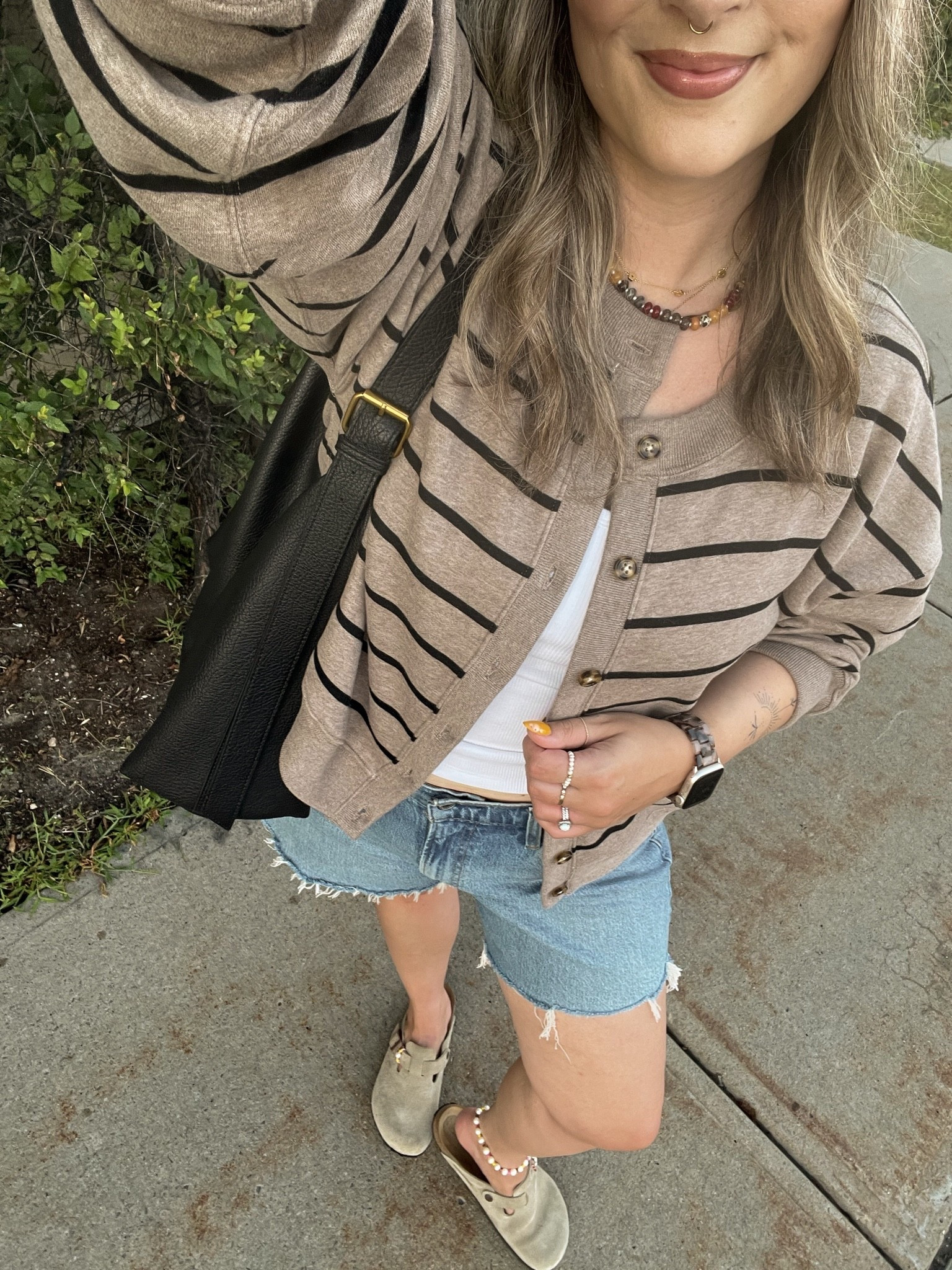 Abercrombie summer to fall transitional outfit on sale! Wearing size L in the striped cardigan sweatshirt and size M in the bra free tank. Sized up to 32 in the denim shorts for a baggy fit. I’m a 9.5-10 shoe and wear a 40 in the Birkenstocks

#LTKfall #LTKsale #LTKmidsize