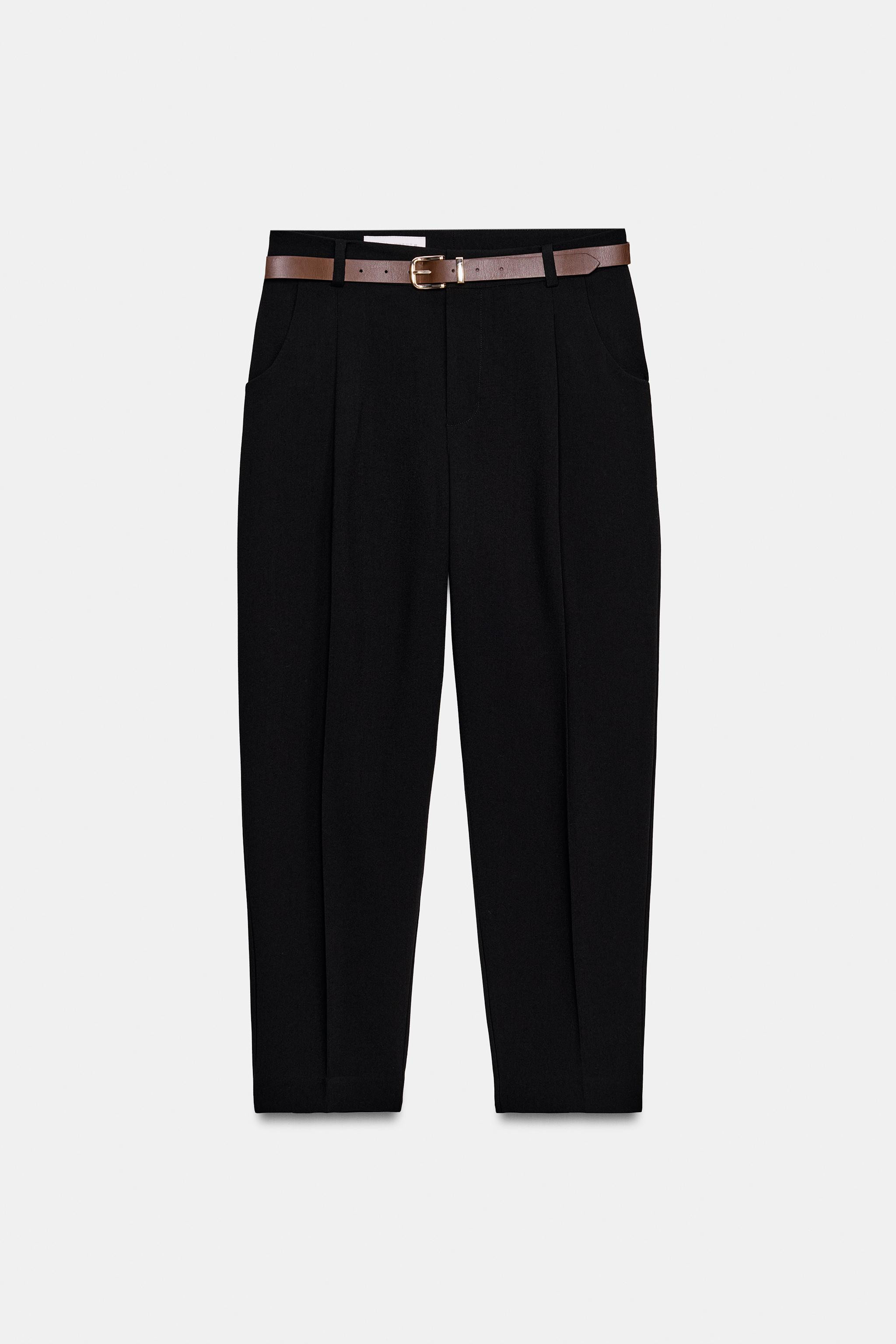 Mid-waist cropped trousers with a belt and front pleats. Featuring front pockets and false flap b... | Zara UK