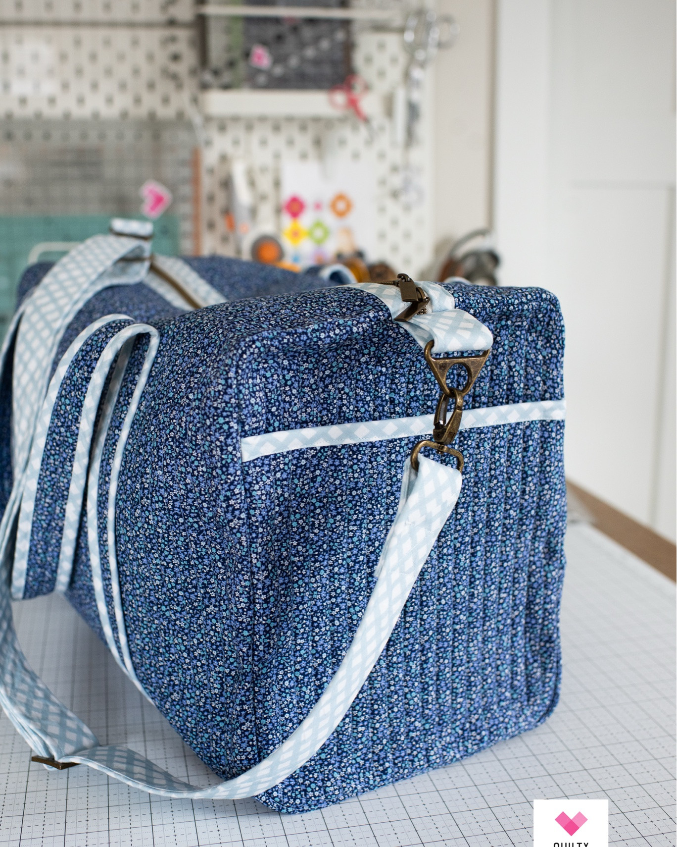 Patchwork Duffle by Knot and Thread.  I customized the straps for this one.  I used soft and stable for them.