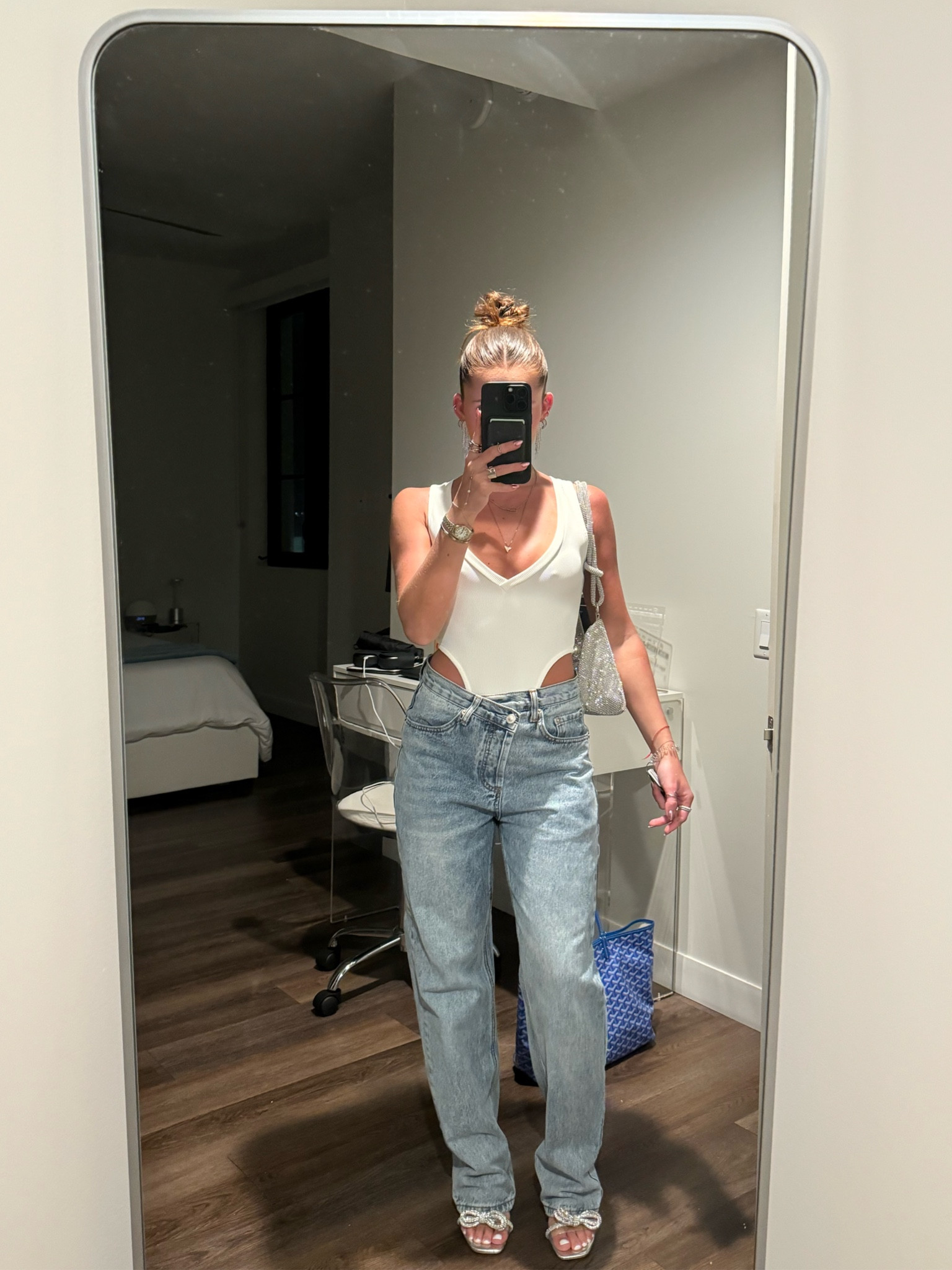 one of my go-to outfits and accessories for a girls’ night out!! 👯‍♀️ i lovvveee the matching silver sparkles on my dangly earrings, bow heels, and purse ✨

#LTKbeauty #LTKfindsunder100 #LTKparties