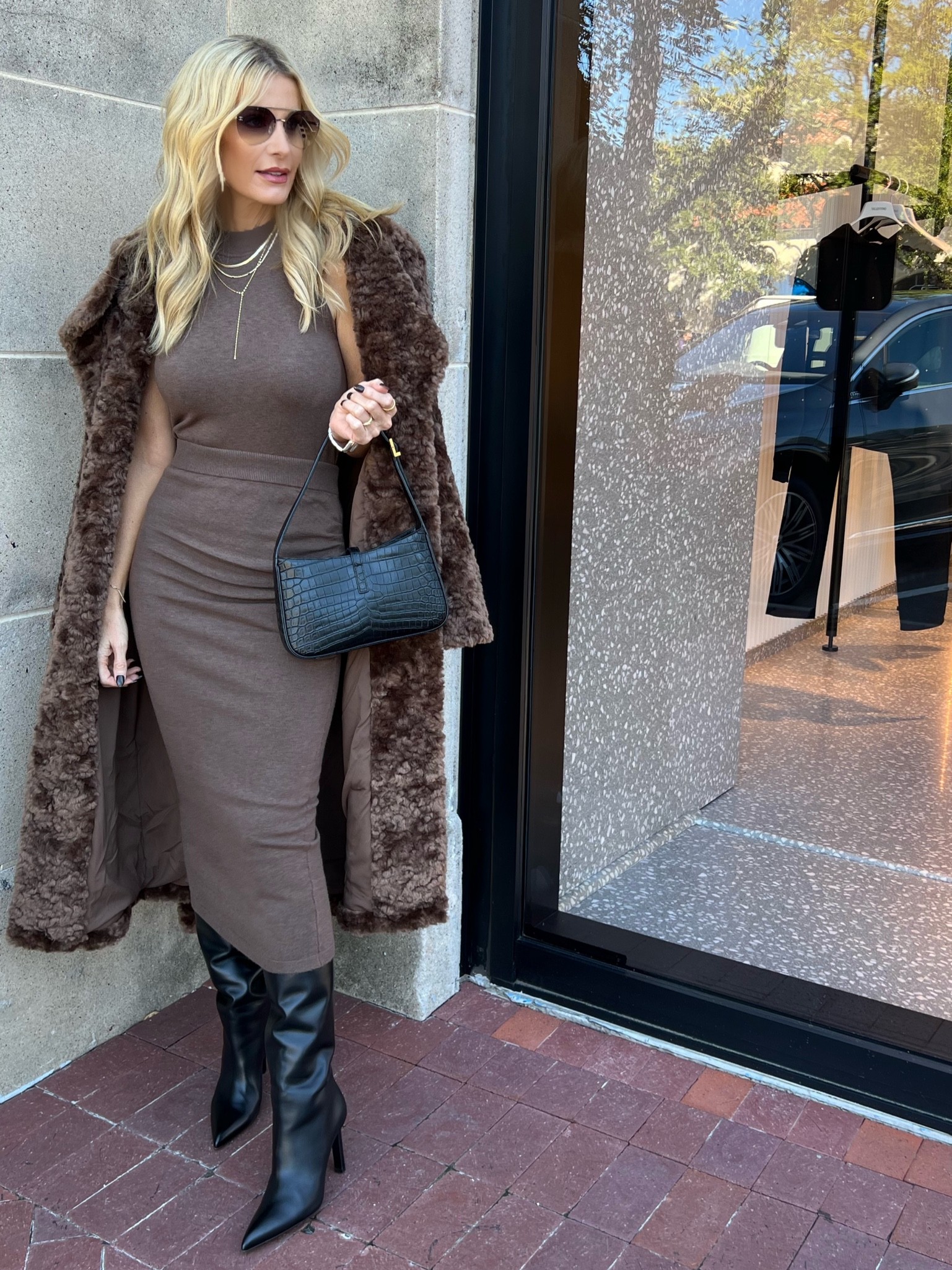 TGIF! If you’re in need of so serious fall outfit inspo I’ve got you covered! I just published a new YOUTUBE VIDEO featuring 10 timeless FALL LOOKS for every occasion so be sure and check that out! #linkinstories 

This is one of my favorite fall looks from @express and it’s ALL 30% OFF!! Wear this trio set (midi skirt, sweater tank, and duster) now with heels and wear it later when it gets colder with this stunning faux fur coat and some fabulous knee-high boots! Which look is your fave? #expressyou #expresspartner 

Everything runs tts, I’m wearing an XS in all pieces. 

#LTKsalealert #LTKstyletip #LTKunder100