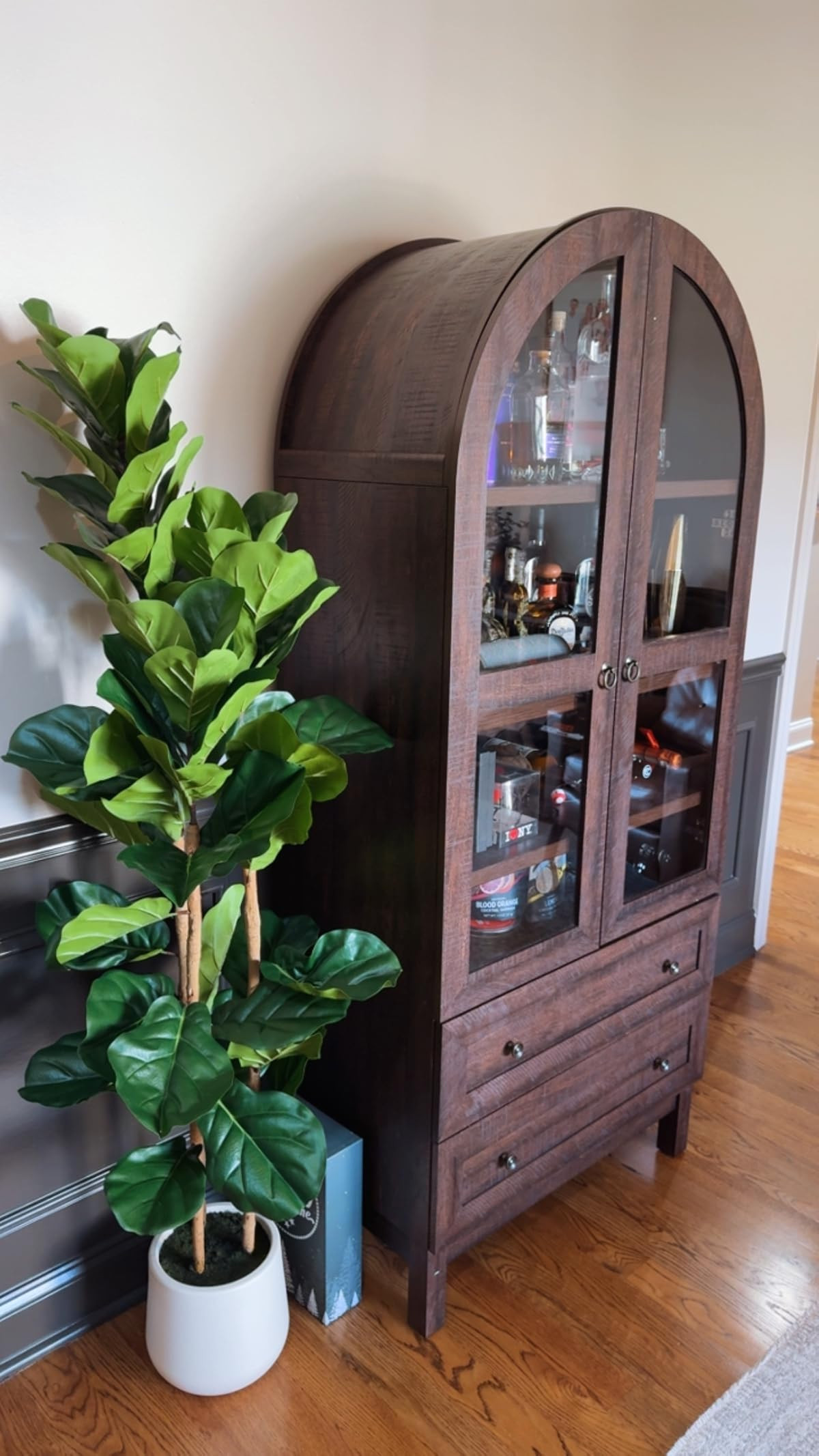 I love this artificial fiddle leaf fig tree, it's a perfect addition to my home decor. Styling it next to my arched bookcase that I'm using as an extra pantry cabinet!  

 #LTKfoodie #LTKHome