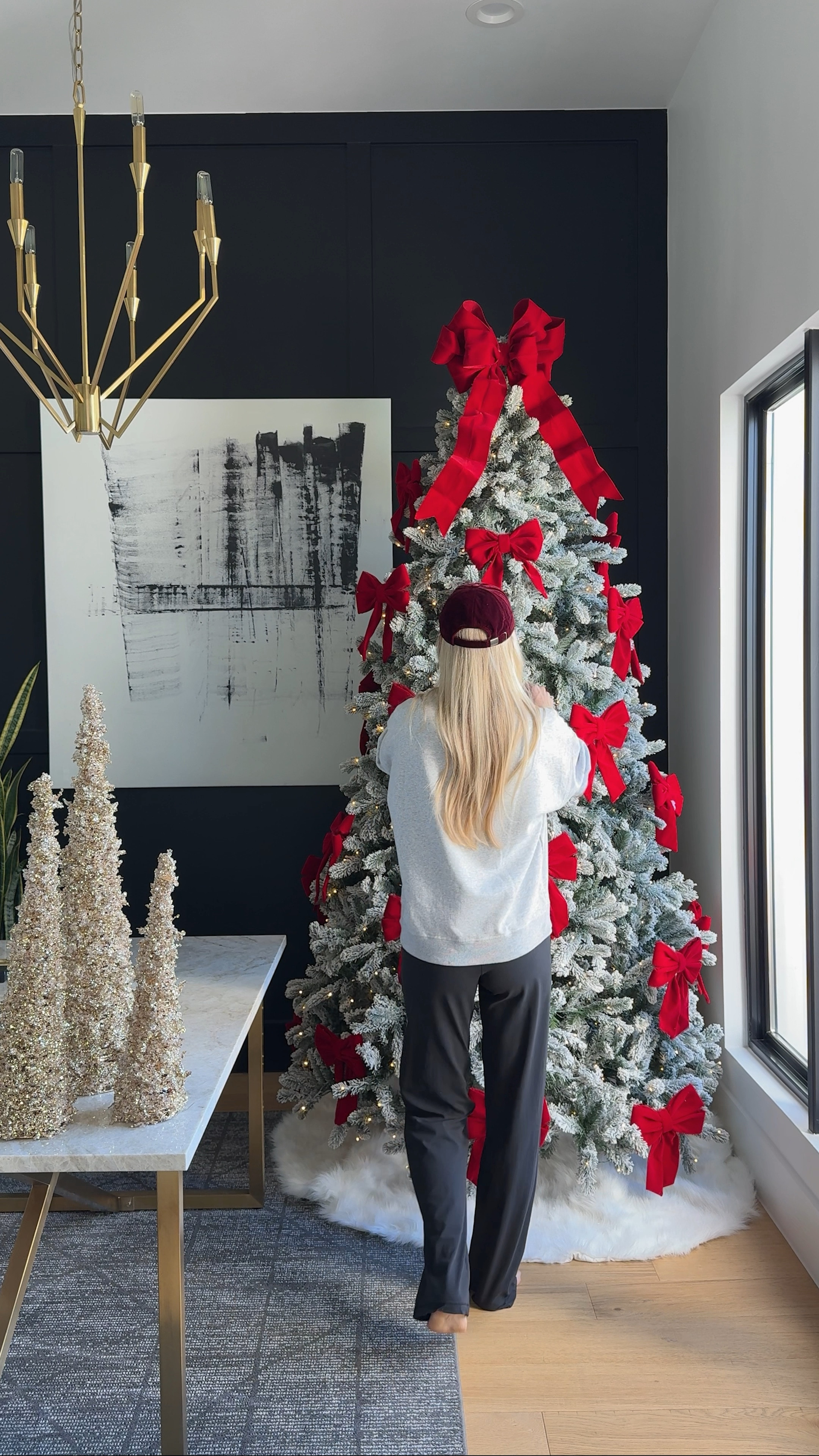Make Christmas Red Again! 🎄✨ 

This year, I’m all about the classic charm of big red bows on this beautiful 9’ King Flock® Christmas Tree from @kingofchristmas.

And don’t get me wrong—I love the simplicity of a traditional green tree, but there’s something so magical about the snow-dusted branches of a flocked tree. Totally worth the vacuuming  after setup .

Who else is bringing back red for the holidays? 

#LTKVideo #LTKHoliday #LTKHome