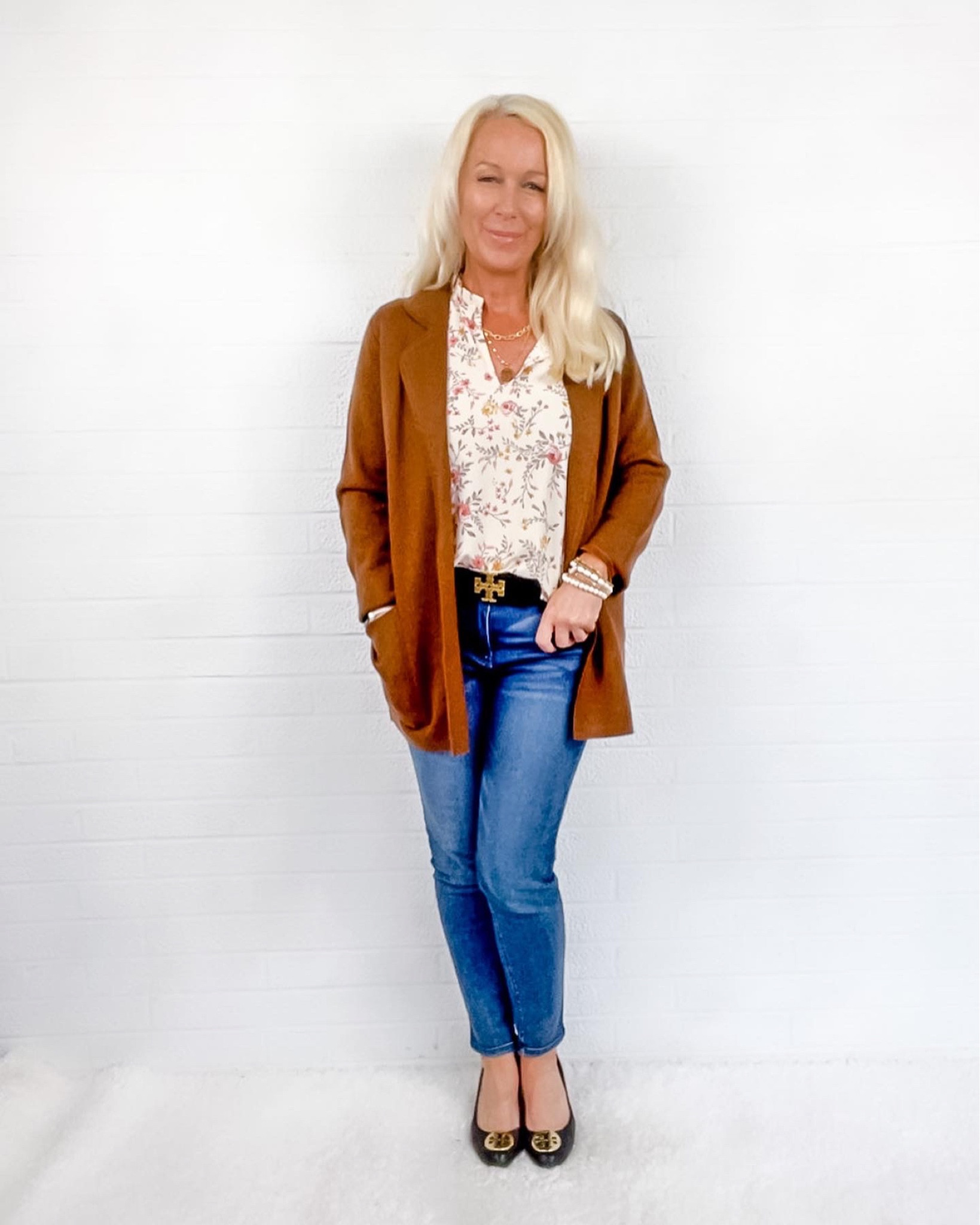 A coffee brown cardigan is a good piece for those late summer to early fall days when its cool in the morning and evening. 5’1 4P:
- Brown Sugar Sweater Blazer XSP (runs big - ON SALE!)
- Floral Flutter Sleeve Top S
- Comfy Skinny Jeans
- Tory Burch Belt
- Wedge Pumps

#LTKworkwear #LTKstyletip #LTKsalealert