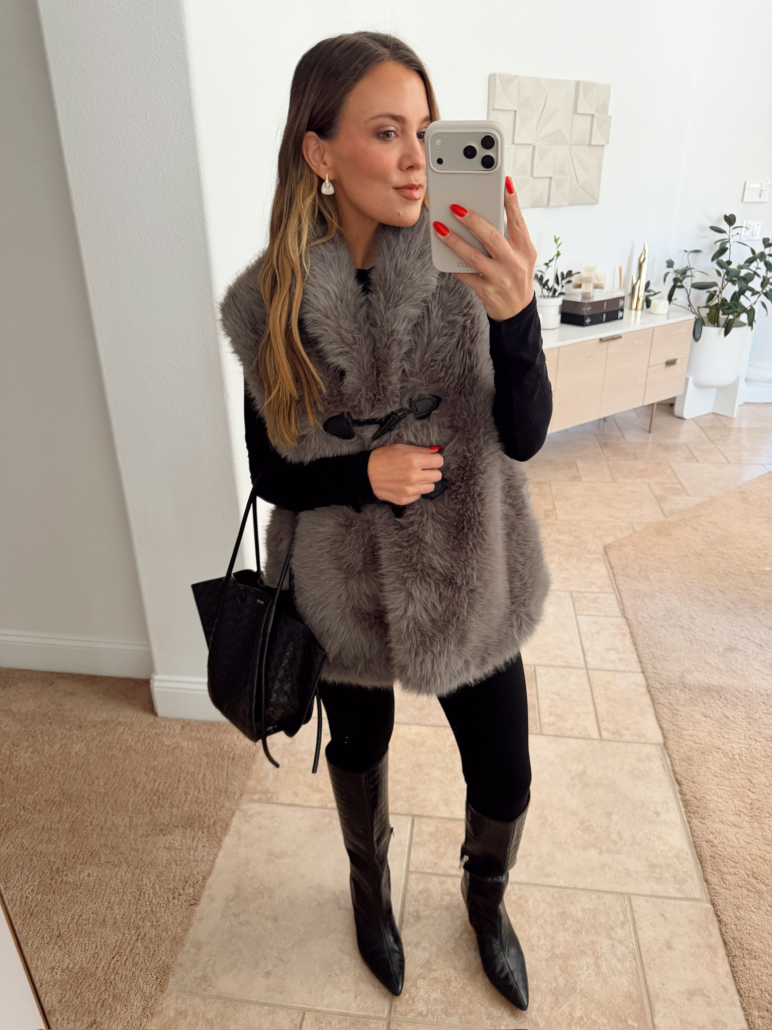 Such a chic winter outfit and all of it is part of the Nordstrom anniversary sale! Size medium and size 9 in boots