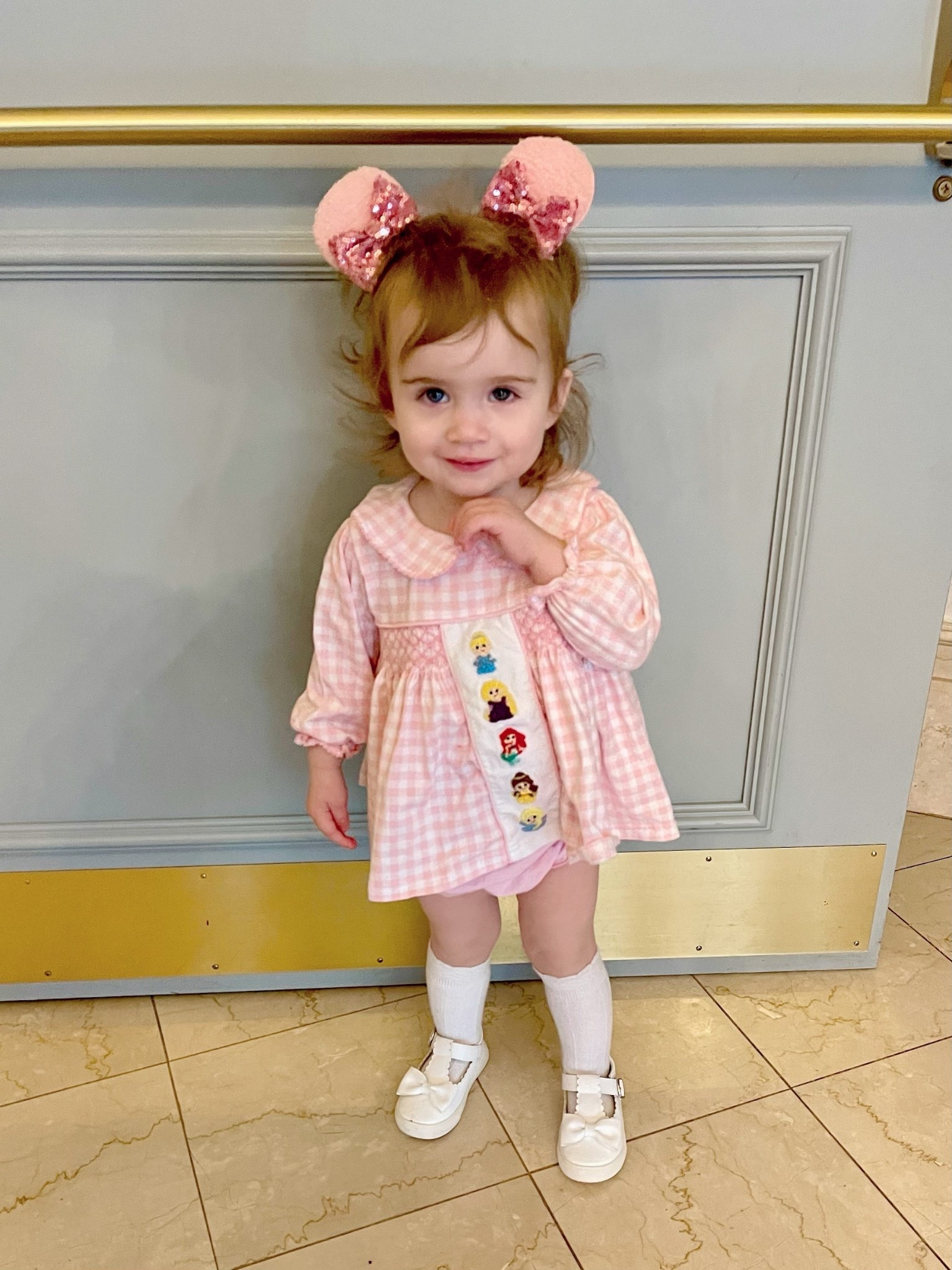 Princess Dinner at The Grand Floridian 👑✨💗



The sweetest little princess dinner outfit for our night at the Grand Floridian 💗🏰 This smocked gingham bubble with tiny embroidered princesses could not be more perfect — classic, comfortable, and so precious for photos! Paired with her white bow shoes and knee high socks for that timeless toddler look I love.

And these mini mouse ear clips continue to be the MVP… they stay put without bothering her head 🙌 Perfect for long park days, character dining, or just strolling around the resort 🌸

Such a beautiful, calm evening — soft piano music, twirls in the lobby, and one very happy tiny princess 💕✨

toddler disney outfit • princess dinner disney world • grand floridian resort • disney toddler style • smocked toddler outfit • classic baby girl clothes • girly disney outfit • toddler mouse ears clips • comfortable toddler shoes • family disney vacation outfits • little girl dress ideas • mommy & me disney vibes • magical childhood memories

#LTKBaby #LTKKids #LTKTravel