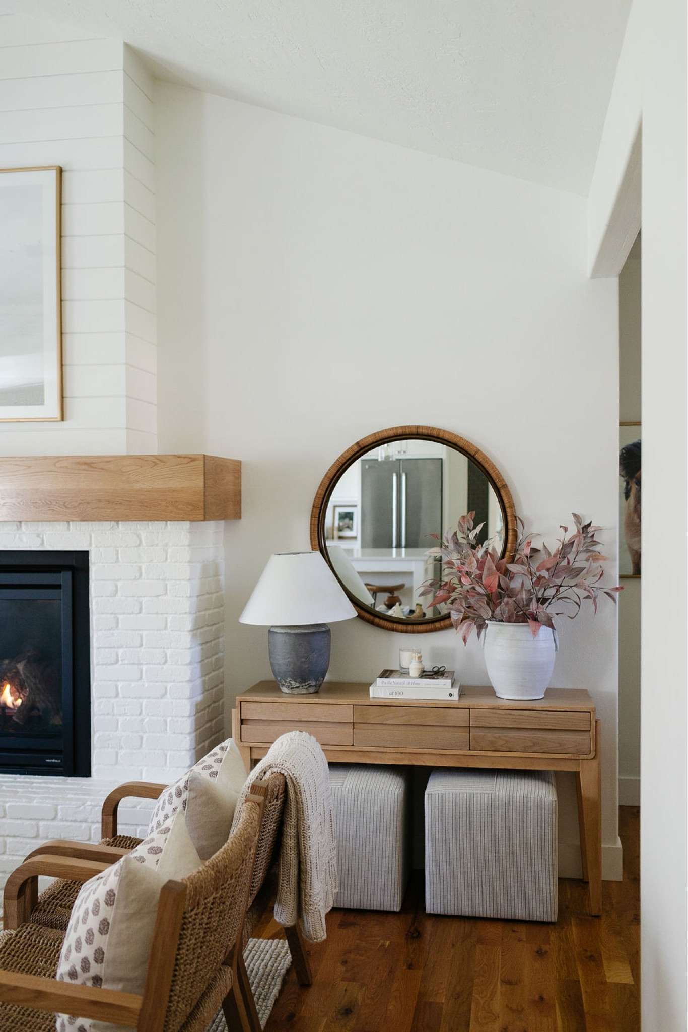 A simple console table perfect for fall. 
Fall decor, Fall stems, table lamp, upholstered Ottomans, target console table, round mirror. Target Studio McGee, home decor, living room decor 

#LTKSeasonal #LTKhome #LTKsalealert