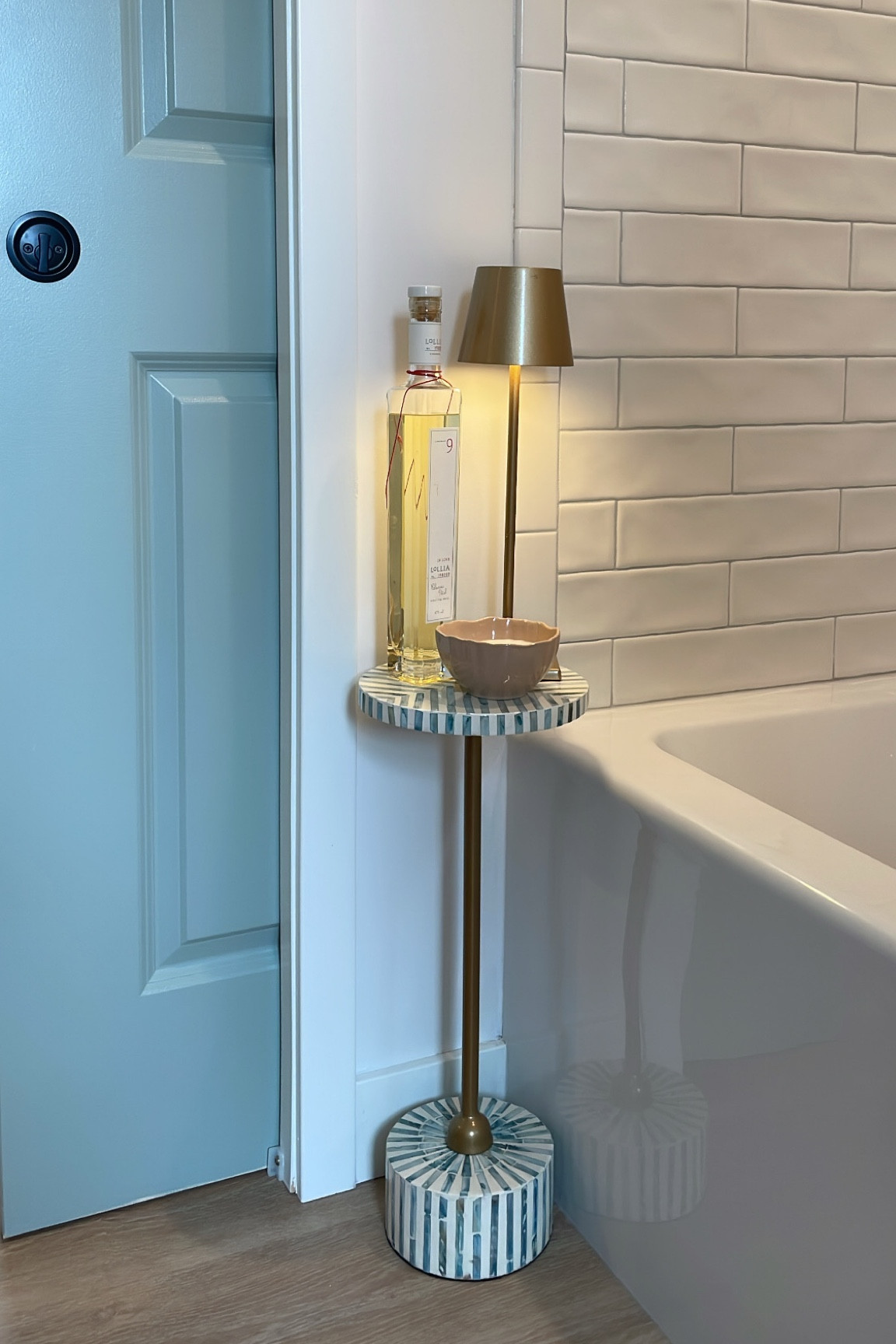 Bathtub decor idea, bathroom lamp, bubble bath decor, small bathroom table 

#LTKFamily #LTKHome #LTKStyleTip