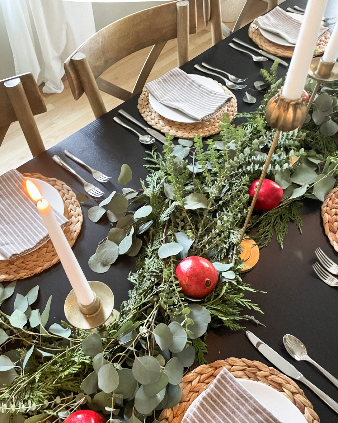 Holiday dining room decor. Christmas table setting. Gold candlesticks. Wicker charger. Rattan charger. Plates. Dining room chairs. Dining room table.

#LTKSeasonal #LTKhome #LTKHoliday