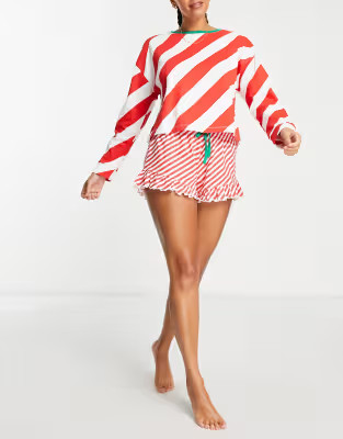 ASOS DESIGN Christmas striped slouchy sweatshirt & shorts pajama set in red & white | ASOS (Global)