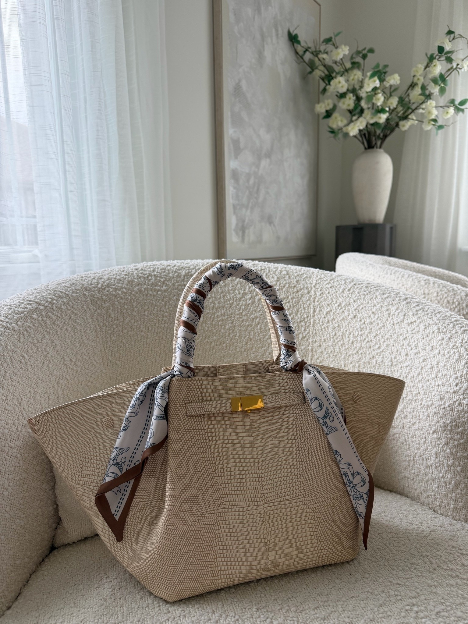 An easy way to make a simple neutral bag feel more elevated? Add a scarf to the handle ✨
It gives that effortless designer-inspired look and instantly makes the whole outfit feel more styled without trying too hard. Loving this soft neutral combo for spring/summer.

#LTKgrwm #LTKootd