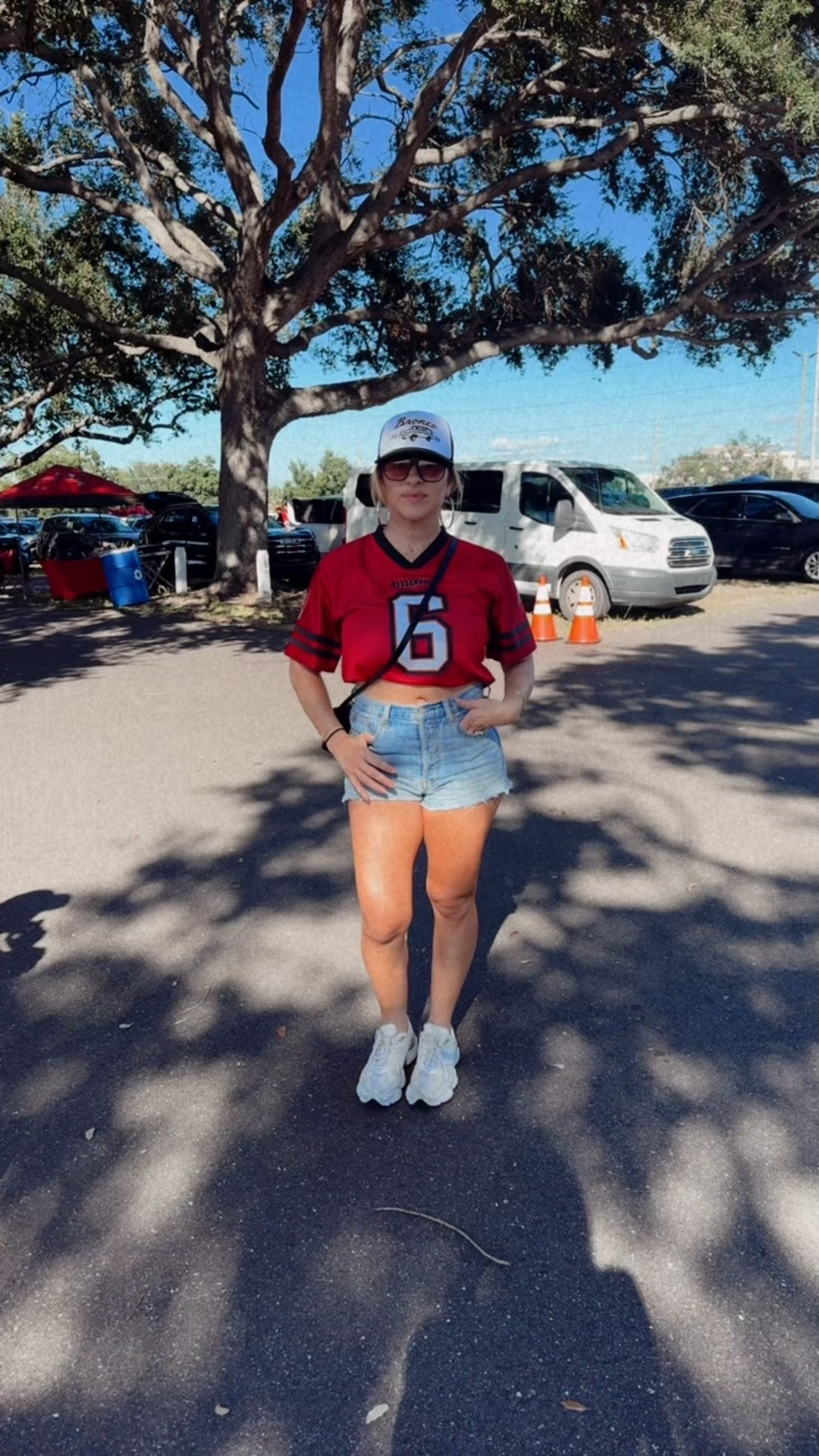 Sizing reference: Height: 5’2” | Weight: 135 lbs | Waist: 27” | Usually wear size M in tops

Game day ready in my favorite casual combo 🏈💋
This cropped Buccaneers jersey from Walmart is such a steal and pairs perfectly with my Aritzia denim shorts for that effortless, sporty vibe. Finished it off with New Balance sneakers for all-day comfort while tailgating and cheering in the stands!

#GameDayOutfit #LTKFallStyle #WalmartFashion #AritziaDenim #NewBalanceSneakers #OOTD #SportsStyle #TampaBayBuccaneers #CasualChic #LTKUnder50 #LTKWeekendStyle

