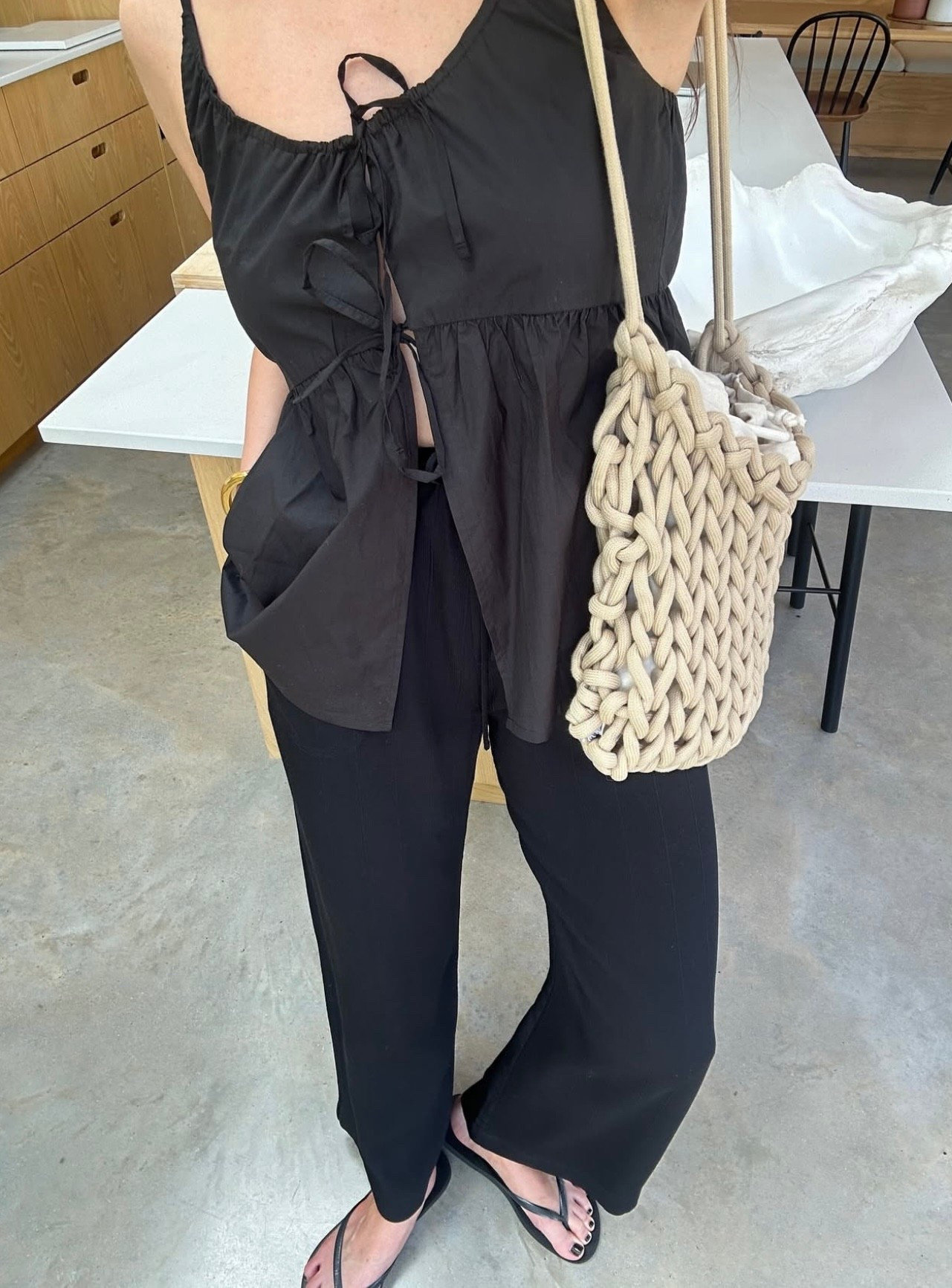 An all-black base styled with a fun woven bag. Easy, minimal, and ideal for low-key summer evenings.

#LTKsummer #LTKstyletip