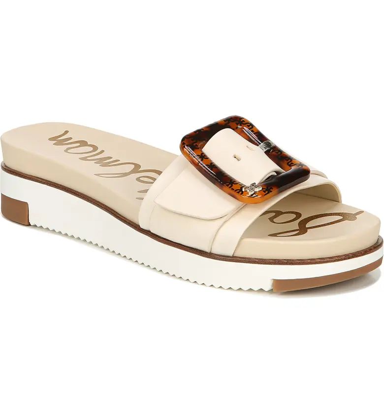 Glimmering buckle hardware stands out at the strap of a sleek slide grounded by a sporty razor-lu... | Nordstrom
