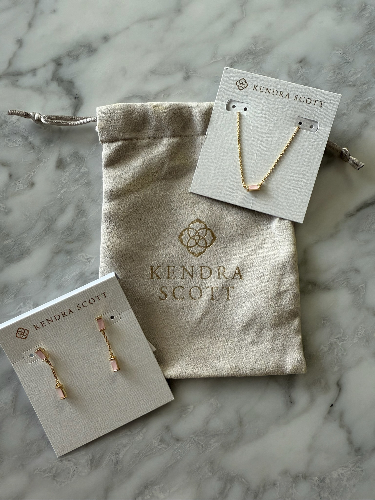 I just got in the prettiest Kendra Scott rose quartz earrings and necklace. These would make a beautiful gift for her! Kendra scott jewelry // gift ideas // gifts for her // earrings // necklace 

#LTKFindsUnder100 #LTKGiftGuide #LTKHoliday