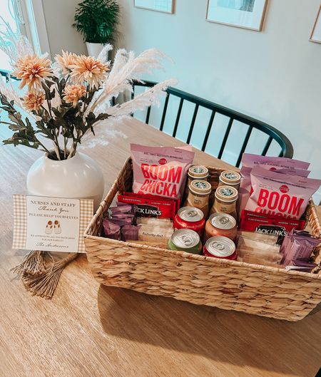 Nurse Thank You Baskets for the Hospital!🤍 We got all these items at Target with the exception of the thank you tag!🫶🏻
Ideas: 
-grab and go snacks such as individual popcorn or chip bags, trail mix, granola bars, candy/chocolate. 
-drinks: like poppi, olipop, starbucks frappuccino’s, water
-misc: gum, pens, lip balm, notepads, scrunchies/hair ties/claw clips 