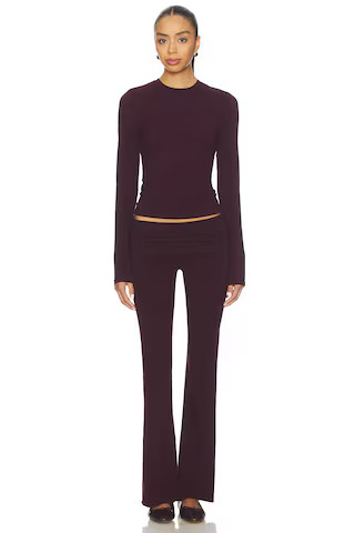 SKIMS Cotton Jersey Long Sleeve T-shirt in Currant from Revolve.com | Revolve Clothing (Global)