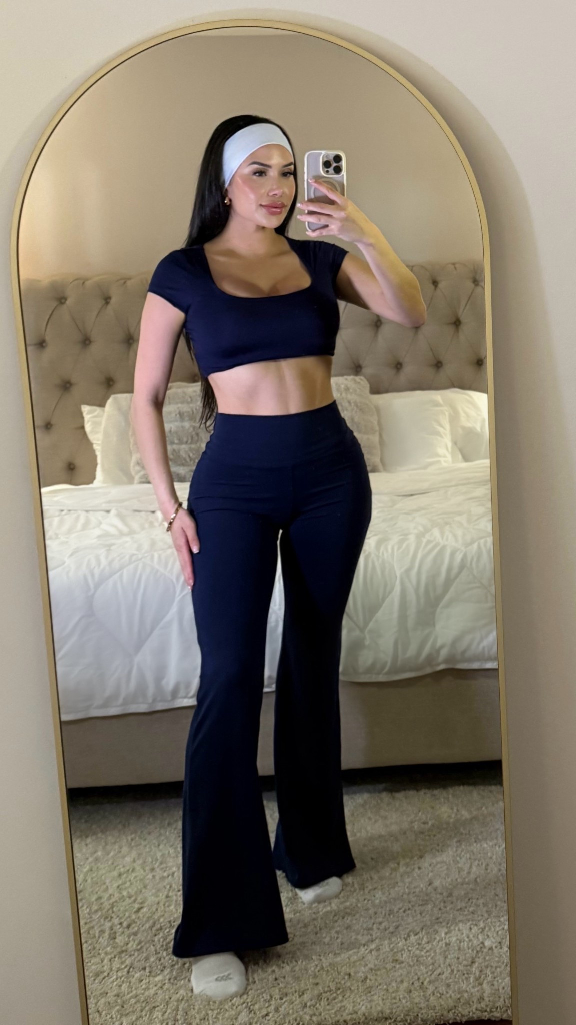 This super soft navy set from @Target  is perfect for lounging or yoga! The buttery scoop neck top can be easily folded into a cropped look, and the flare leggings are so comfy. Plus, the white headband adds a cute pop✨

#LTKActive #LTKgrwm #LTKootd