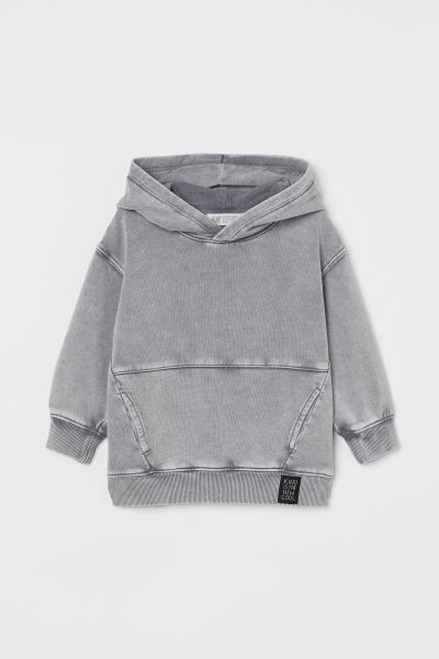 Sweatshirt hoodie in lightweight, cotton-blend fabric with a washed look. Jersey-lined hood, long... | H&M (US + CA)