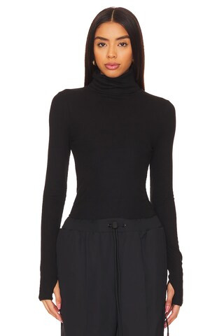 Splits59 Jackson Rib Turtleneck Top in Black from Revolve.com | Revolve Clothing (Global)