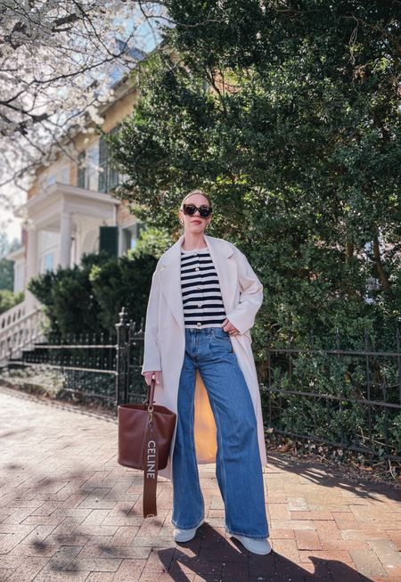 Spring outfit with cream coat, striped button cardigan, wide leg jeans, white sneakers 

#LTKshoecrush #LTKSeasonal #LTKfindsunder100