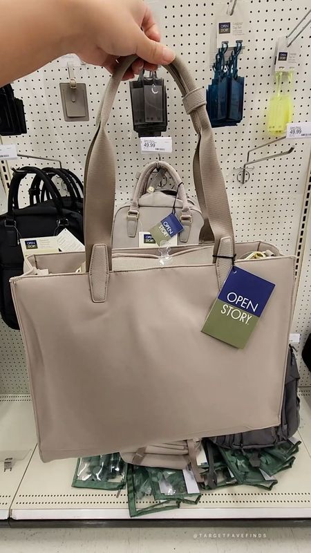 Open Story taupe travel tote bag with luggage sleeve, multiple compartment, zippered, double handles, laptop compartment, comes in black, target finds, targetfavefinds 

#LTKtravel #LTKworkwear #LTKitbag