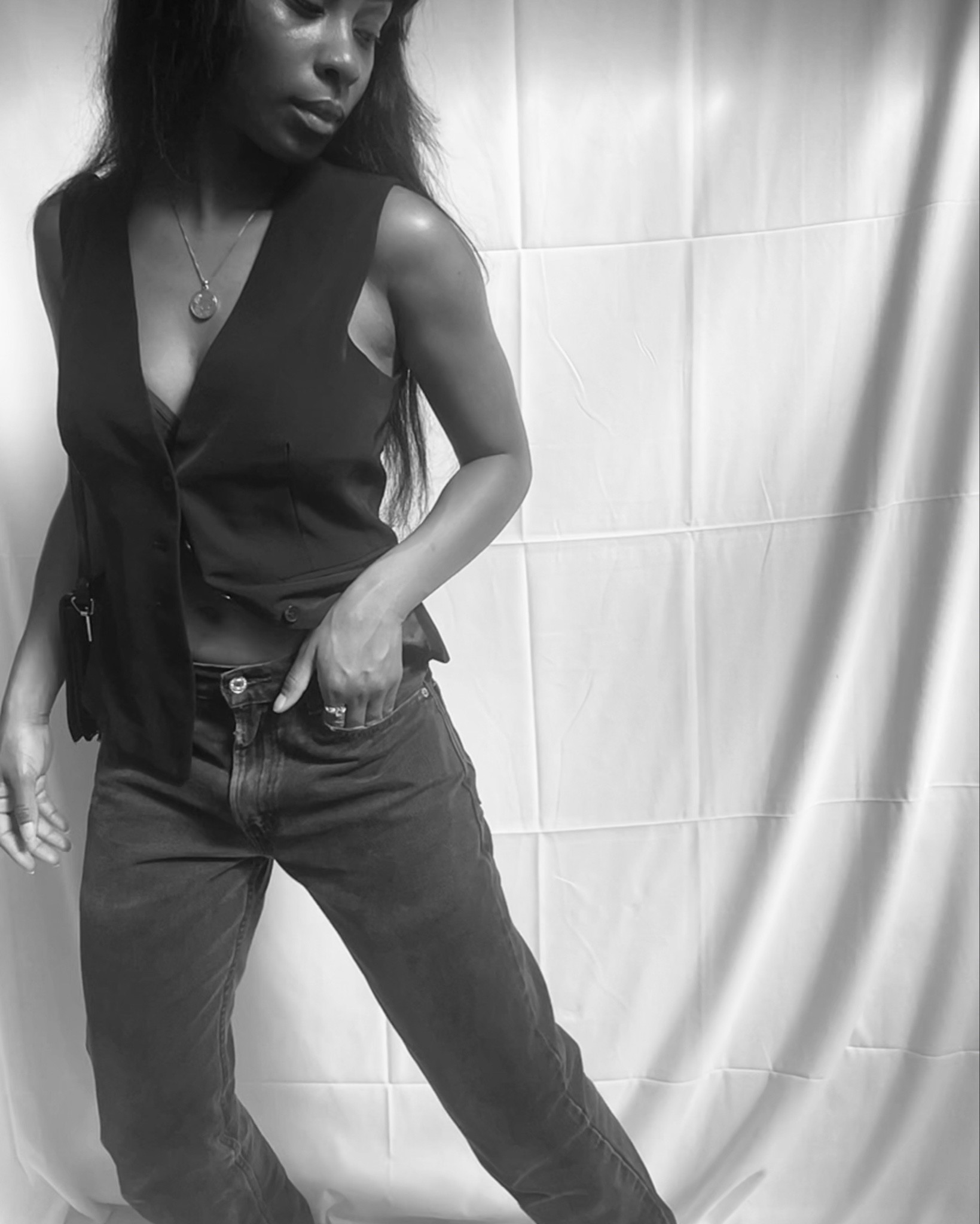 black vest, black jeans, brown loafers, brown bag.

#LTKStyleTip #LTKItBag #LTKShoeCrush