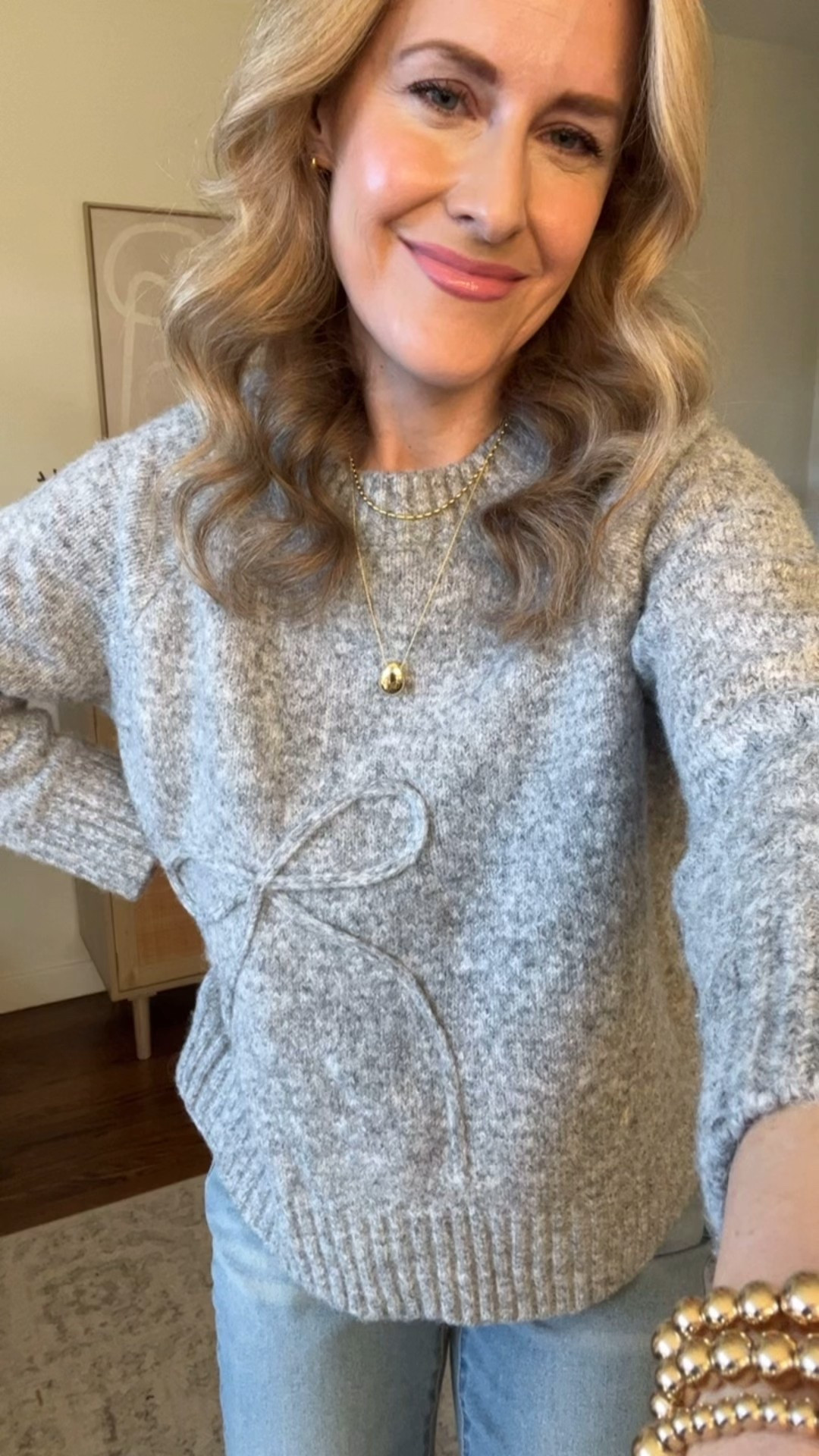 Reader favorite bow sweater $22.98 at Walmart! I’m wearing size 0X. Soft not itchy. #walmartfashion Bootcut jeans just $12! Run small; go up a size (I’m in a size 8). Tall girl friendly. 

#LTKFindsUnder100 #LTKFindsUnder50 #LTKTall