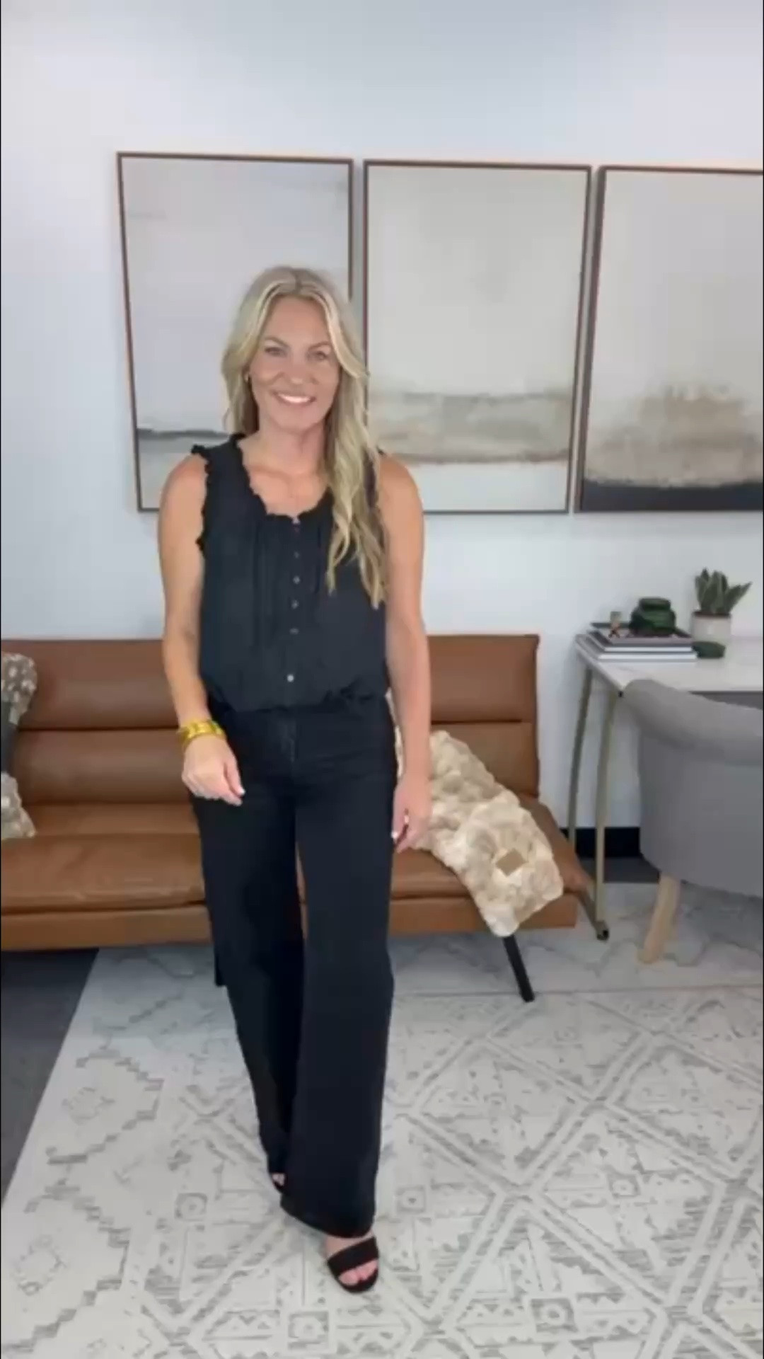 I had dinner after a full day at the office, so an all black outfit made the most sense. This sleeveless blouse has a soft drape with ruffle trim at the neckline, and the high rise jeans sit close through the waist before falling straight through the leg. Add heels and there’s no outfit change required.

Black sleeveless blouse, black jeans, monochrome outfit, office to dinner outfit, high rise denim, straight leg jeans, ruffle neck top, black work outfit, dinner outfit, AudrieDollins

#LTKootd #LTKSeasonal #LTKOver40