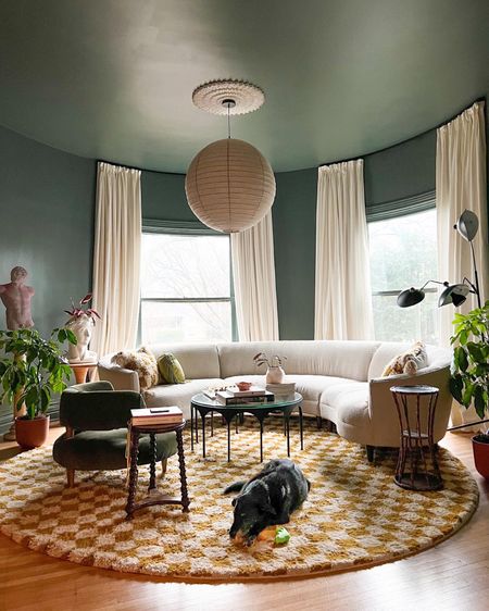 Modern eclectic living room inspiration! Checkerboard patterns and curved sofa dial up the fun factor in this maximalist space.

#LTKstyletip #LTKhome #LTKunder100