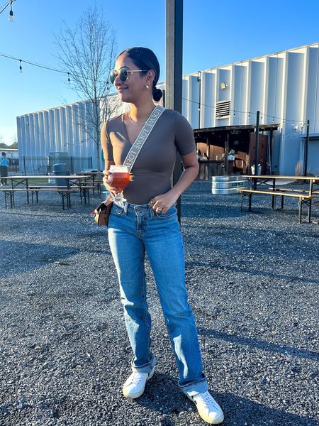Amazon Low rise Levi jeans and a v neck bodysuit! Wearing small in top and 24 in jeans. #Founditonamazon #amazonfashion #inspire #womensstyle Amazon fashion outfit inspiration, Amazon outfit inspo, casual date night outfit, vacation outfit 

#LTKFindsUnder100 #LTKFindsUnder50 #LTKStyleTip