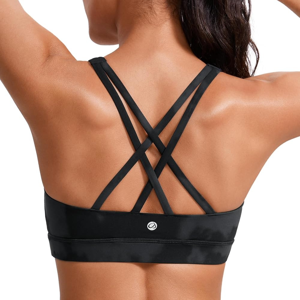 CRZ YOGA Women's Strappy Sports Bras Fitness Workout Padded Yoga Top Criss Cross Back Cami | Amazon (US)