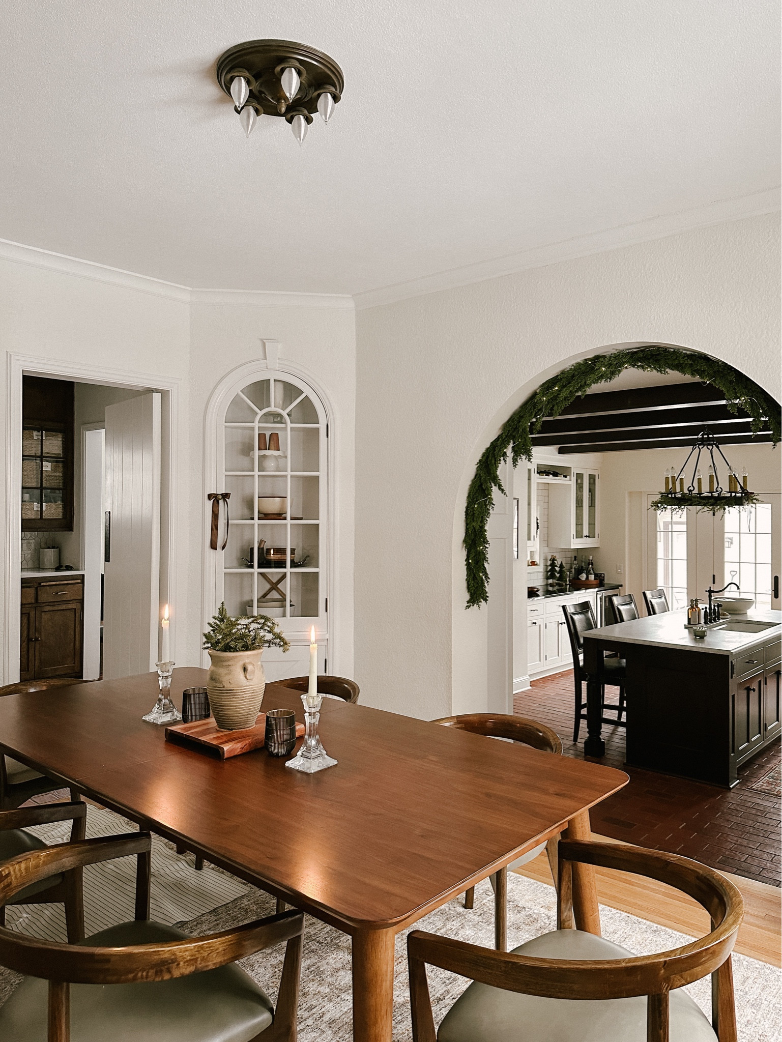 dining room table set up. dining table, dining chairs, crystal candle holder, wire candle holder. garland is sold out but linking what I can find. 

#LTKHoliday #LTKhome #LTKsalealert