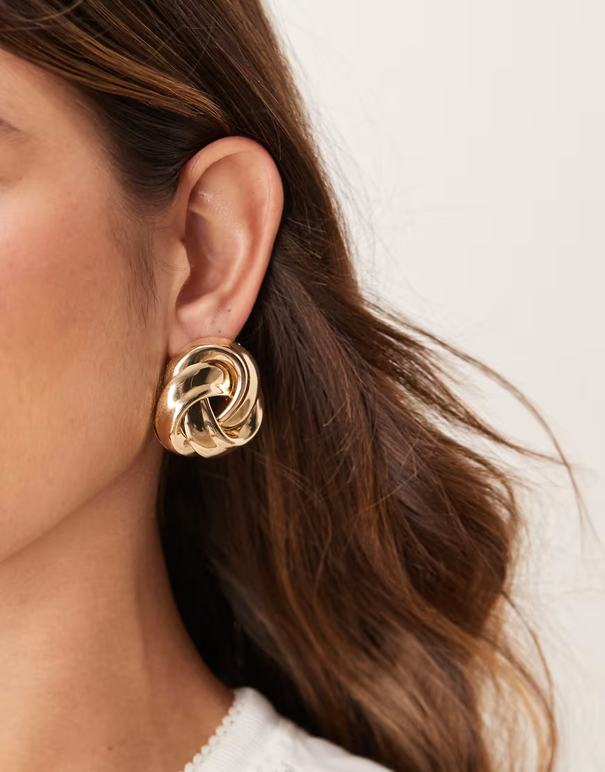 ASOS DESIGN studs with large knot design in gold tone | ASOS (Global)