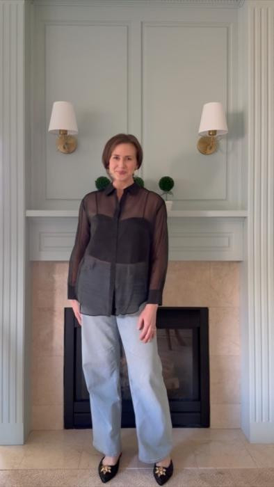 Dressy casual outfit for fall. I love this sheer organza top by Antonio Melan. The tank top underneath is beautifully structured with a corset fit. My American Eagle wide leg jeans have been a staple in my wardrobe, and the bow tie sequin flats are so festive!

For the jeans I’m wearing a size 8 tall  and they’re the perfect length! 

#jeans #shoes #flats #flat shoes #mules #black top #fall outfits 


#LTKootd #LTKTall #LTKCyberWeek