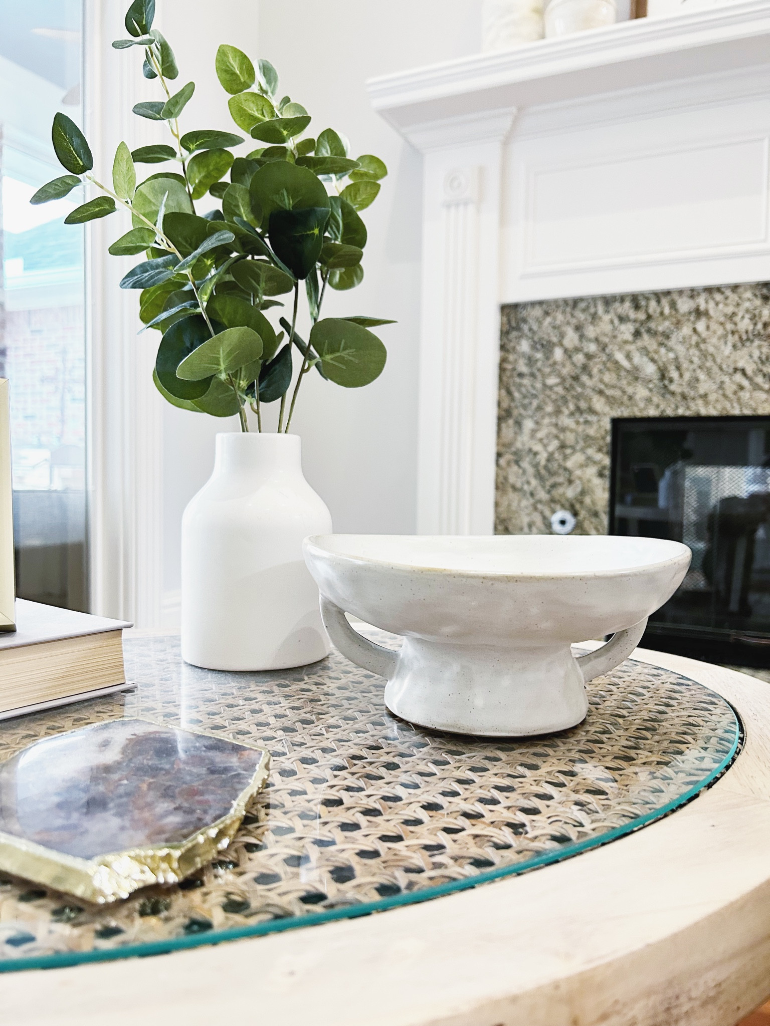 This little white decorative bowl is back in stock. This is one of my favorite pieces to move around. Sometimes I fill it with bowl filler, and other times it remains empty. 

Linking a few table options as mine was a DIY. Also linking my favorite new floor lamp (not visible in this photo) because it’s back in stock and under $70. 

Living room decor, living room corner decor, side table decor, accent table, end table, home decor, white footed bowl, little white decorative bowl, bowl with handles, eucalyptus stems in white vase, small fake plant, table plant, greenery, simple decor, coasters, agate coasters, Anthropologie finds, Amazon home decor finds, Marshall’s decor, cane table, table with rattan shelf, round glass and cane table, pleated lamp shade, accordion floor lamp, modern floor lamp

#LTKunder100 #LTKhome #LTKFind