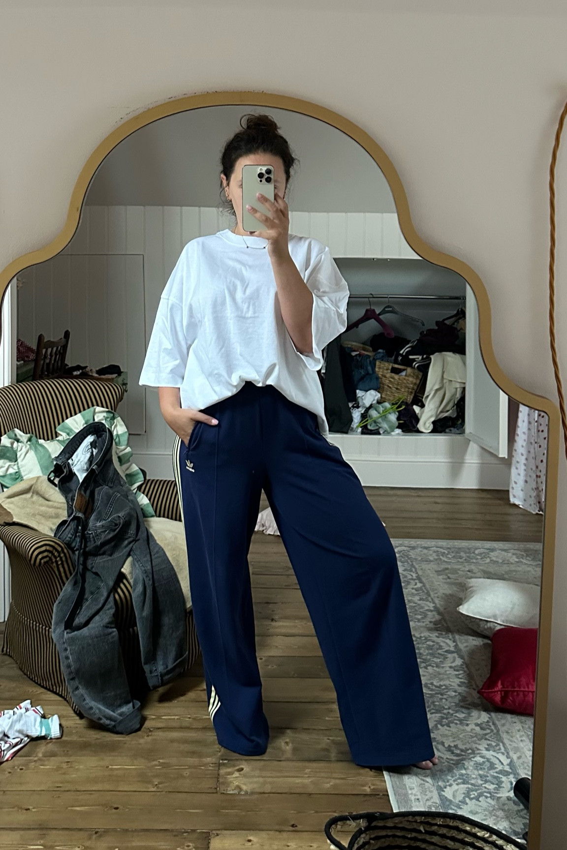 An outfit for a day of errands )including tidying! 😅) and working from home. 

Midsize outfit inspo 🩷

Adidas track pants
Oversize white cotton t shirt 

#LTKuk #LTKstyletip #LTKmidsize