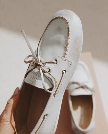 Ahhhh the Miu Miu boat shoes, I wanted to love you so much but it wasn’t meant to be 😩 not only these are extremely difficult to come by (literally impossible to find in brown and suede, but I managed to find them in distressed white at Neiman Marcus) + they are quite expensive and…. Most importantly, once I got them in the mail - a little disappointing. 
They are soft and probably will be very durable, most certainly very stylish and look great on your foot BUT because they’re handmade I found quite a few oddities: uneven stitching and marks of blue ball pen where the shoe leather meets the sole. Long story short I sent these back and ordered a pair of Sperrys and I honestly think they look and feel just as great for 1/10th of the price. If you must have the high end boat shoes I also found these GORGEOUS Bally shoes on Farfetch in deep brown suede and chocolate brown leather that look simply fabulous and are available in all sizes! 

#LTKFindsUnder100 #LTKShoeCrush #LTKSeasonal