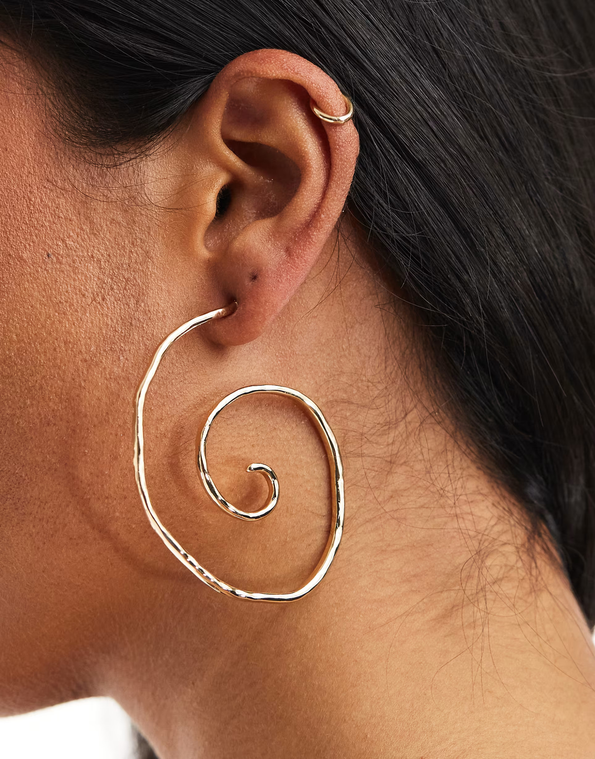 ASOS DESIGN 66mm hoop earrings with swirl design in gold tone | ASOS | ASOS (Global)